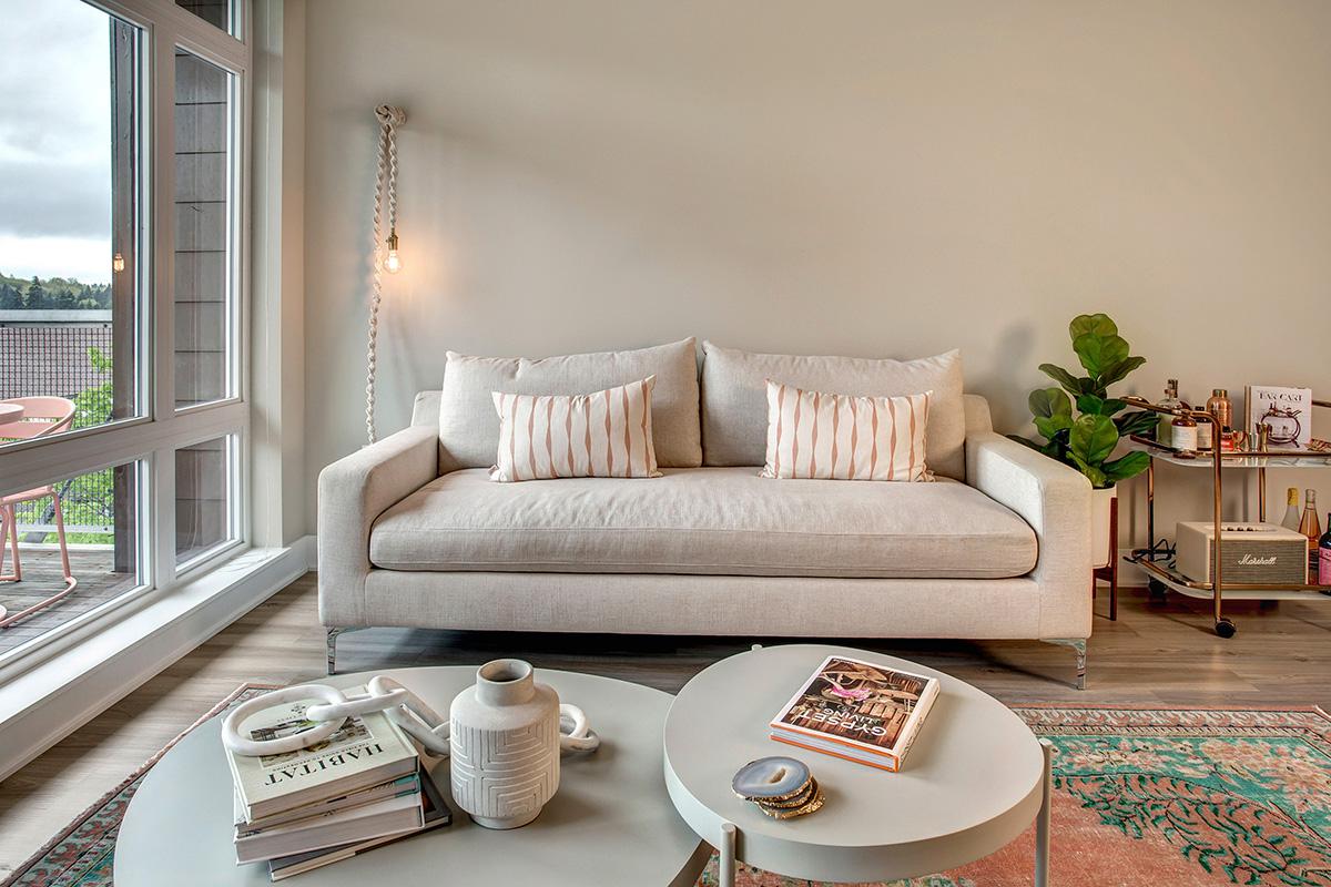 a living room filled with furniture and a fireplace