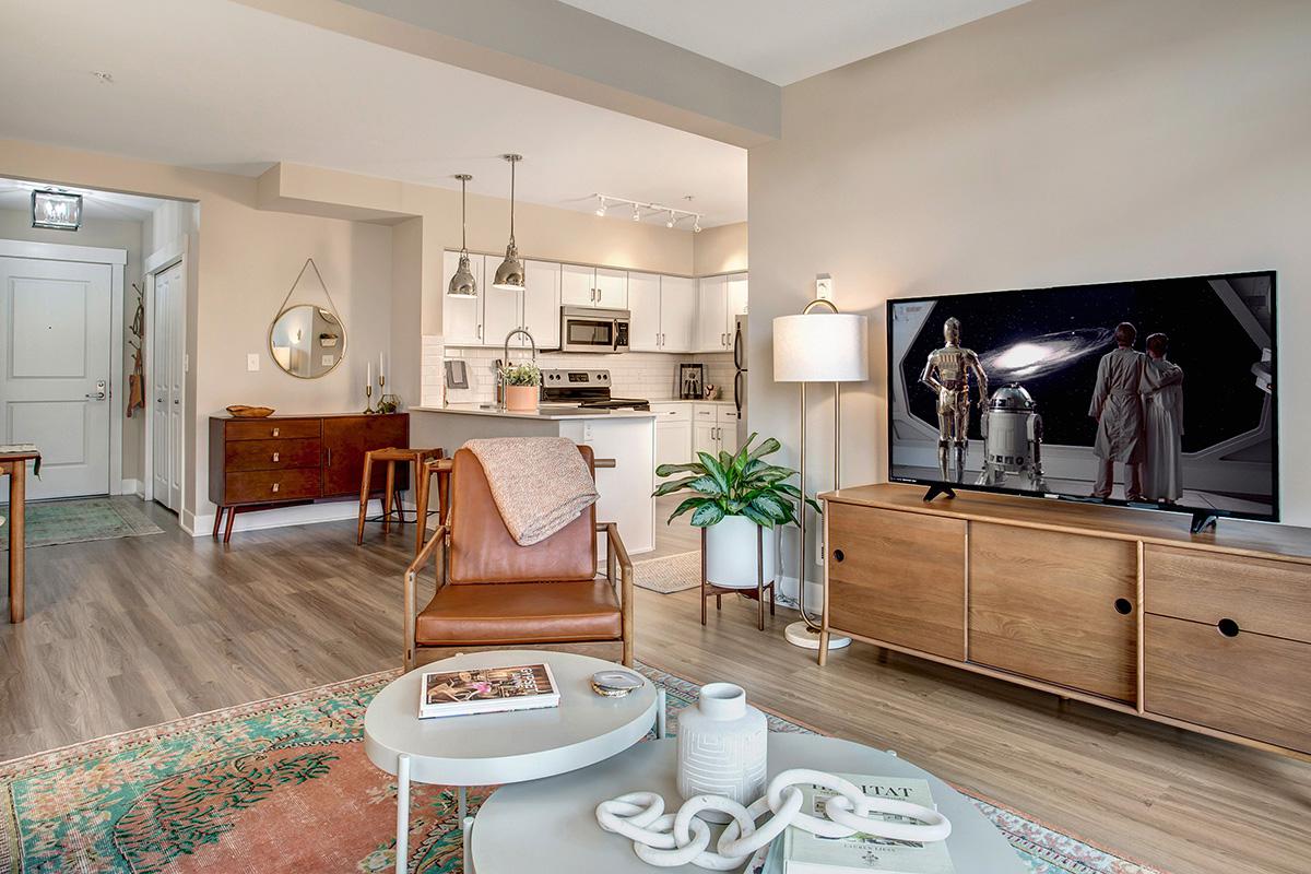 a living room filled with furniture and a fire place