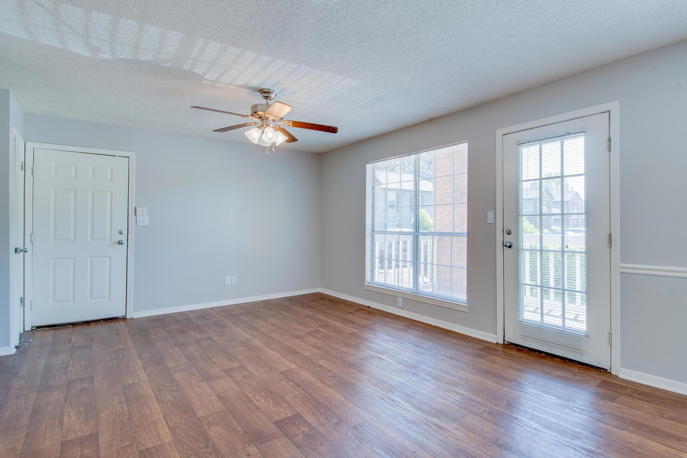 a kitchen with a wood floor