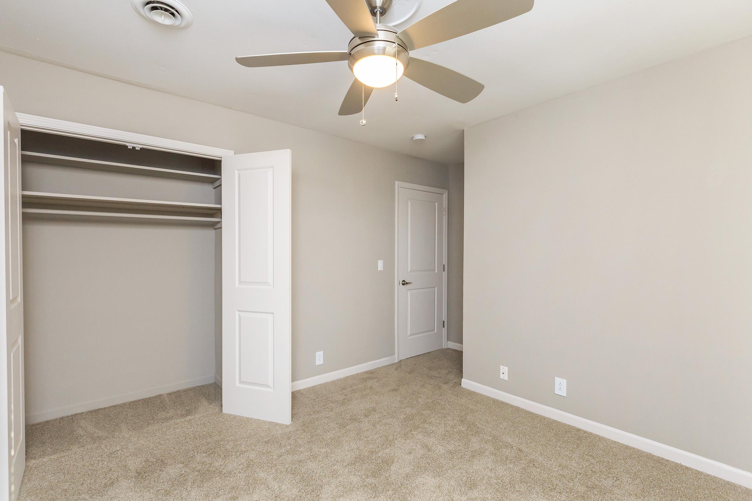 Bedroom with ceiling fan at Colony House in TN