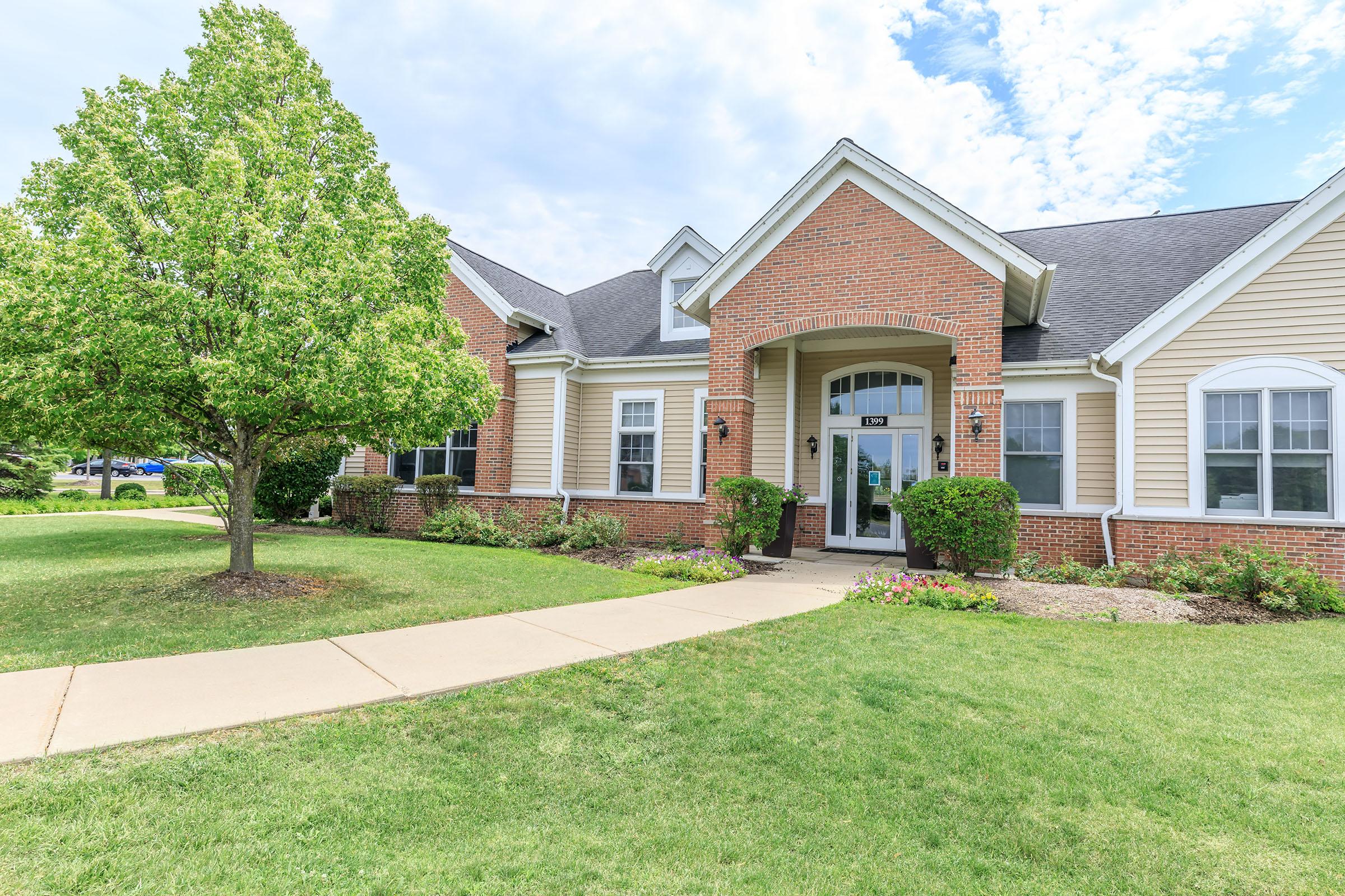 a large lawn in front of a house