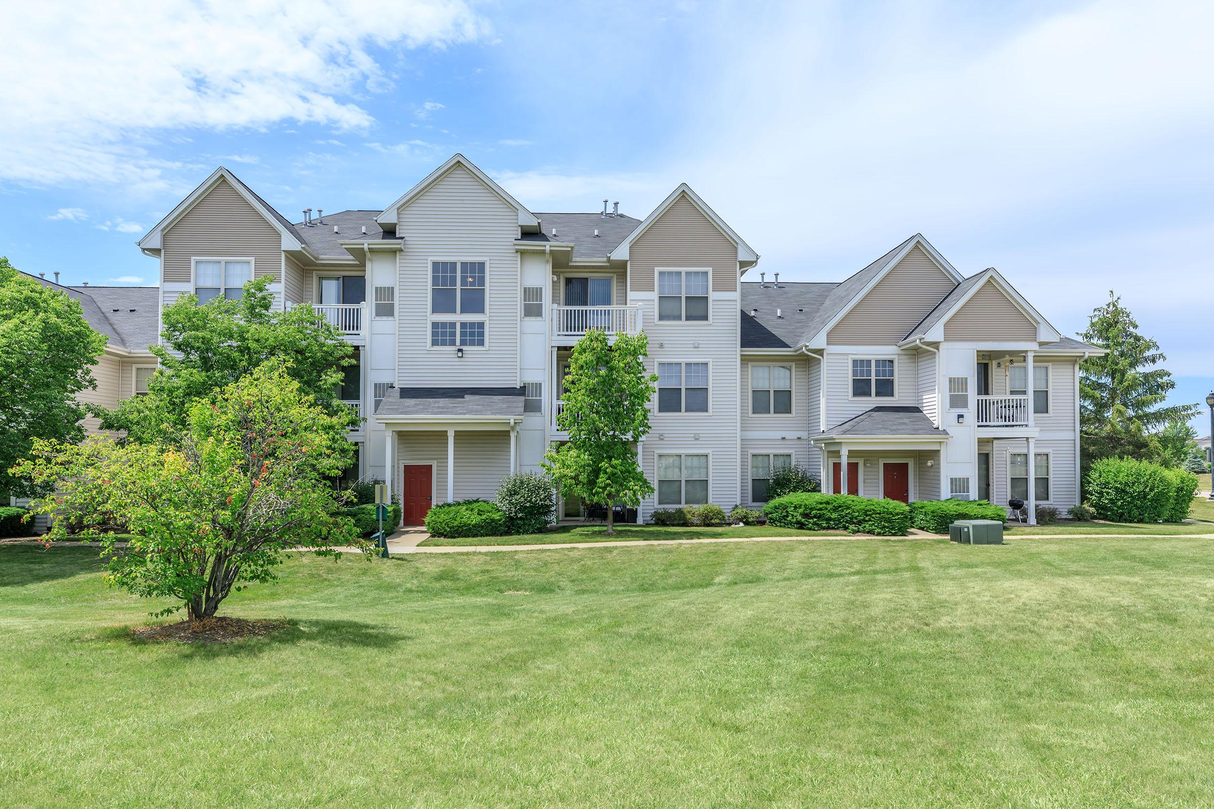 a large lawn in front of a house