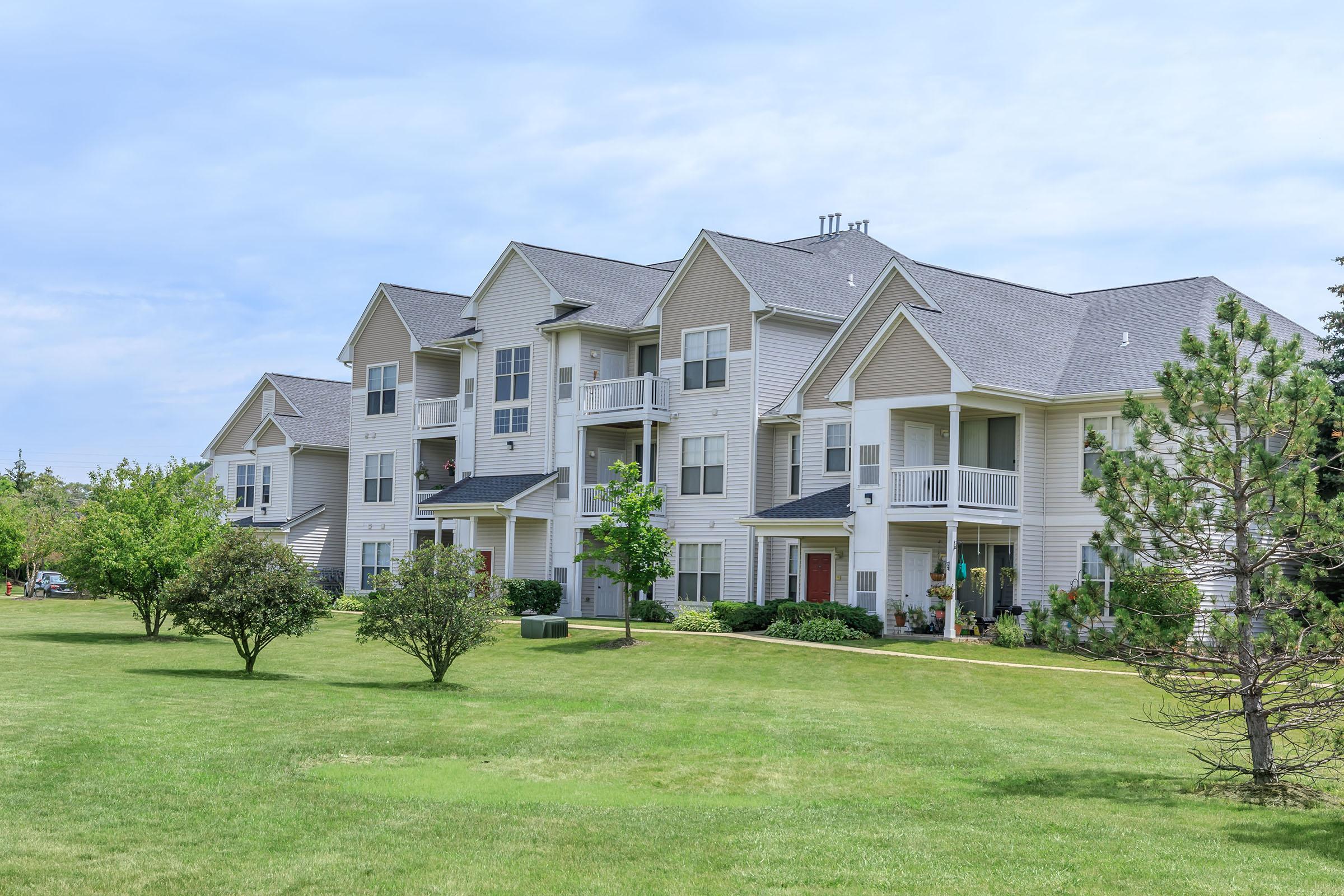 a large lawn in front of a house