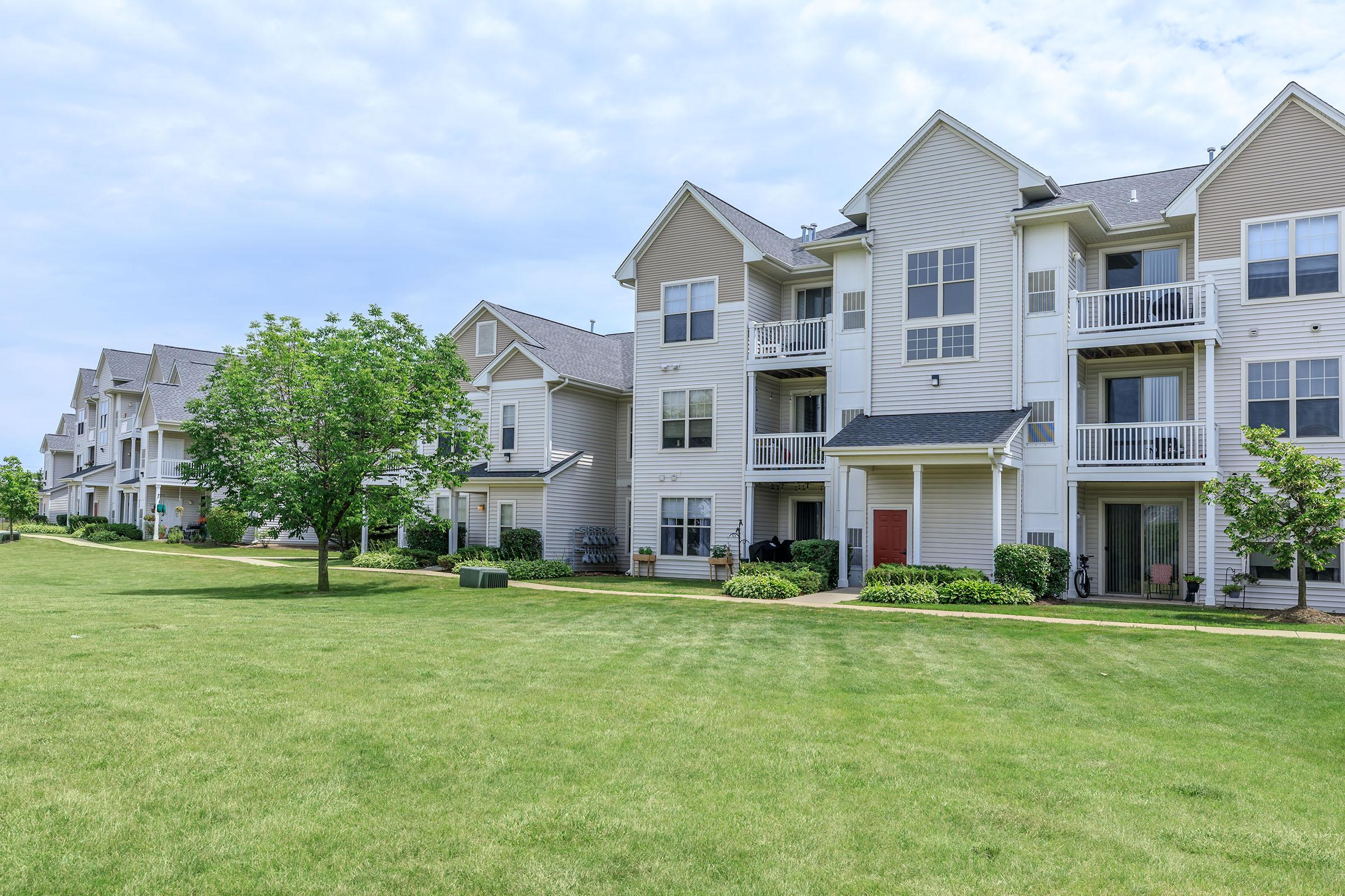 a large lawn in front of a house