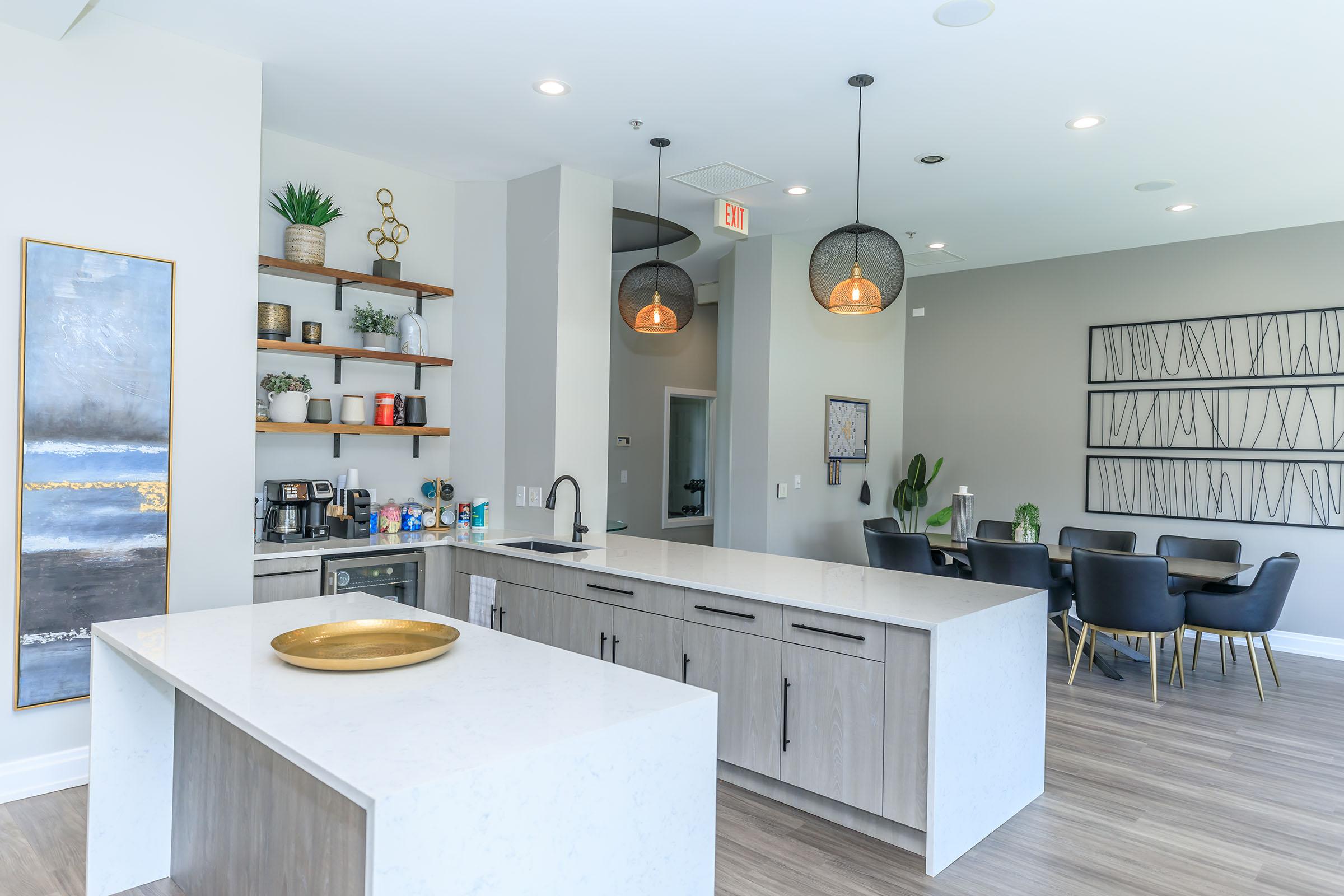 a kitchen with a table in a room