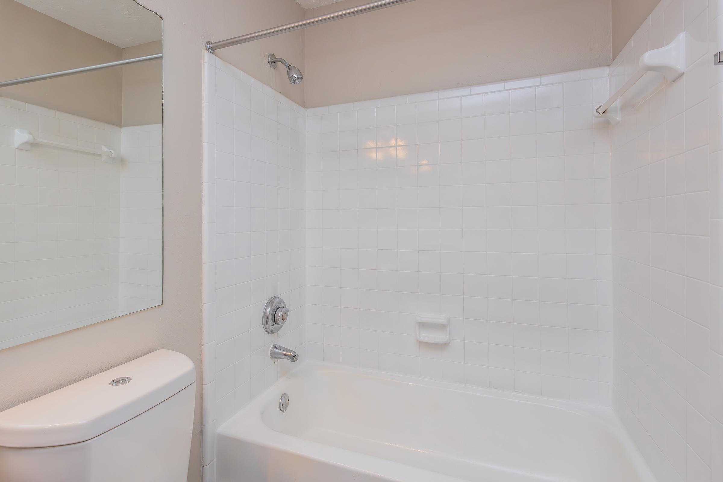 a room with a sink and a bath tub