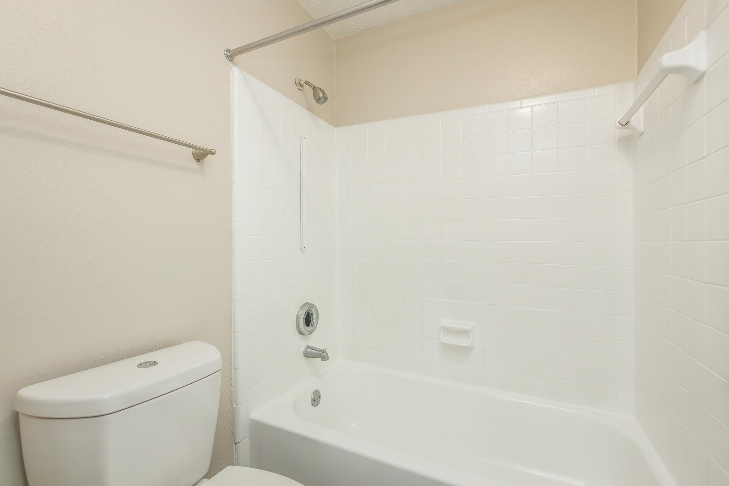 a room with a sink and a bath tub