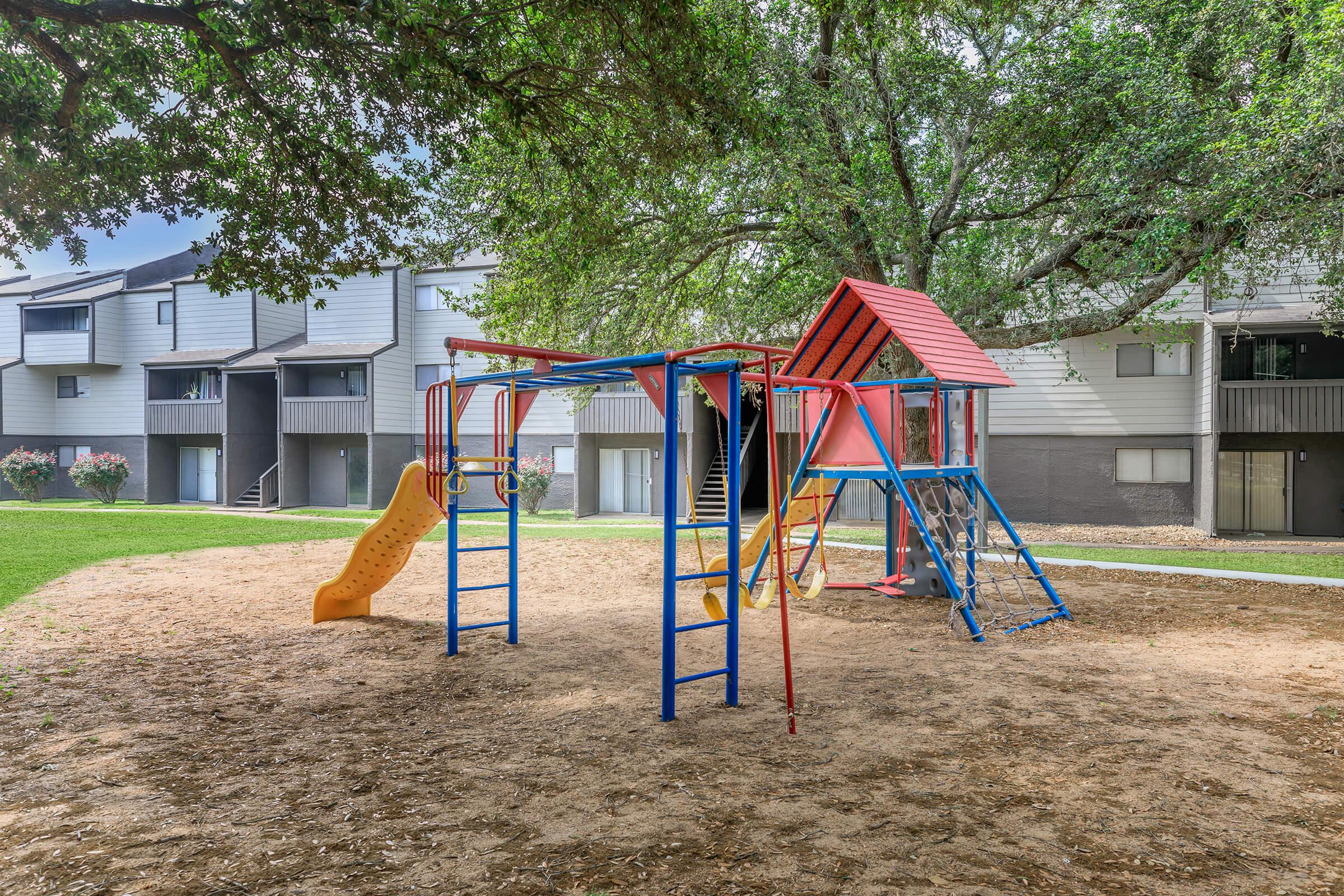 a playground in front of a house