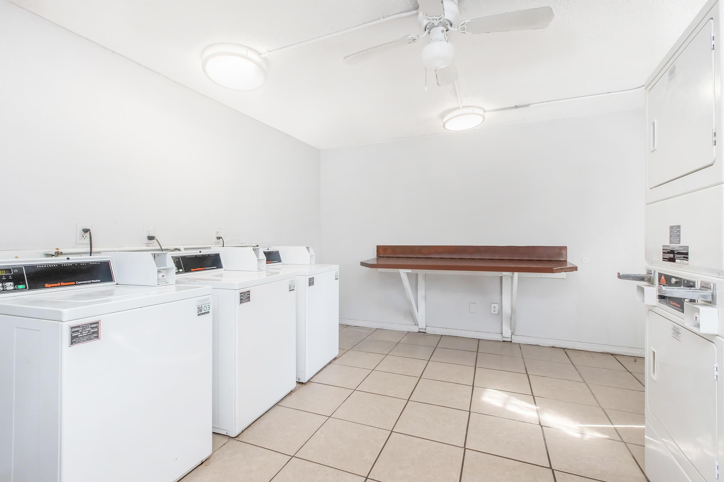 a kitchen with a tile floor