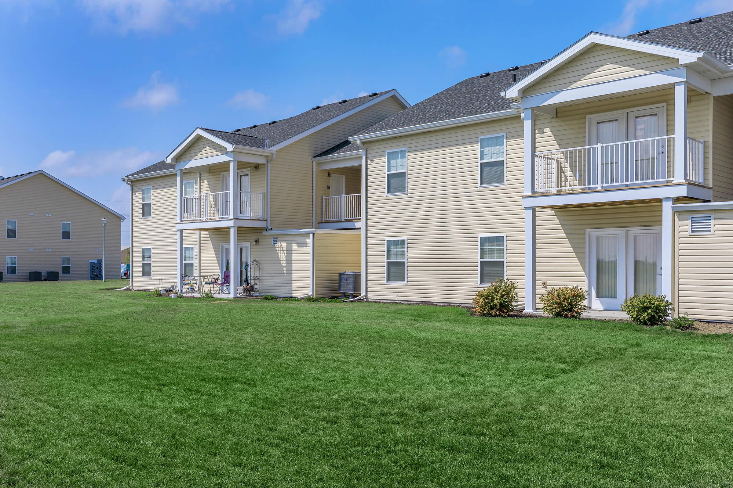 a large lawn in front of a house