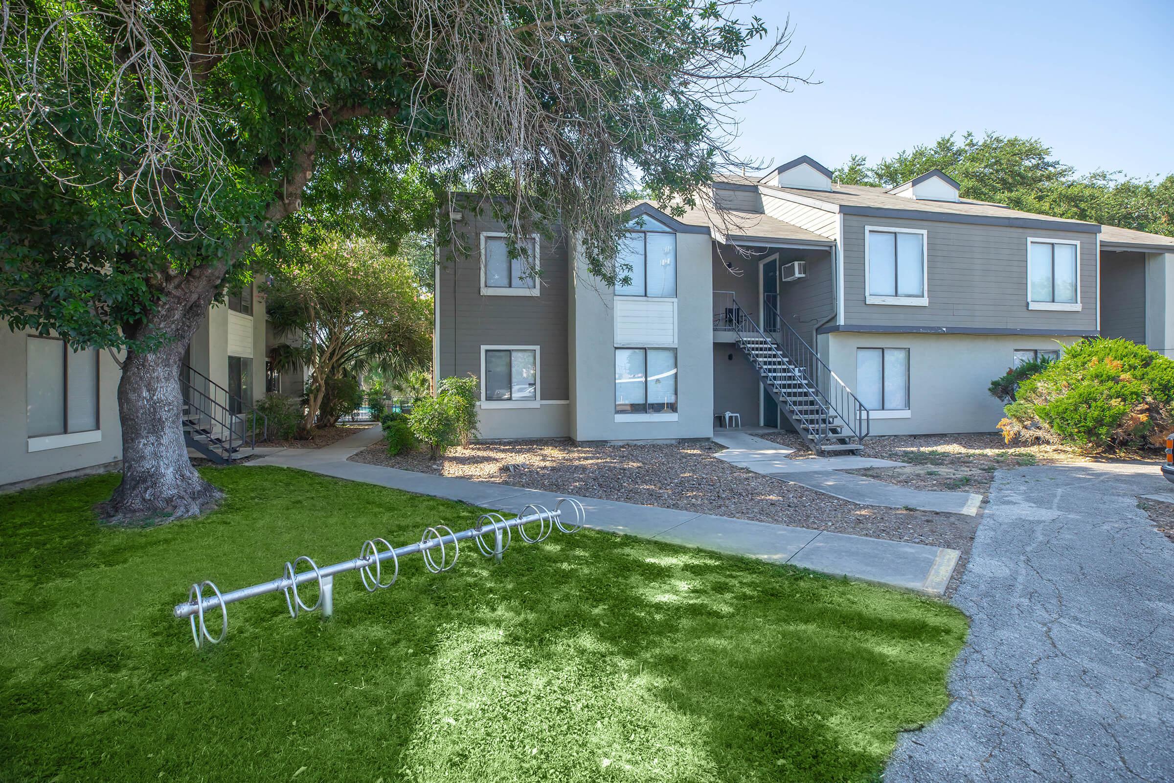 a large lawn in front of a house