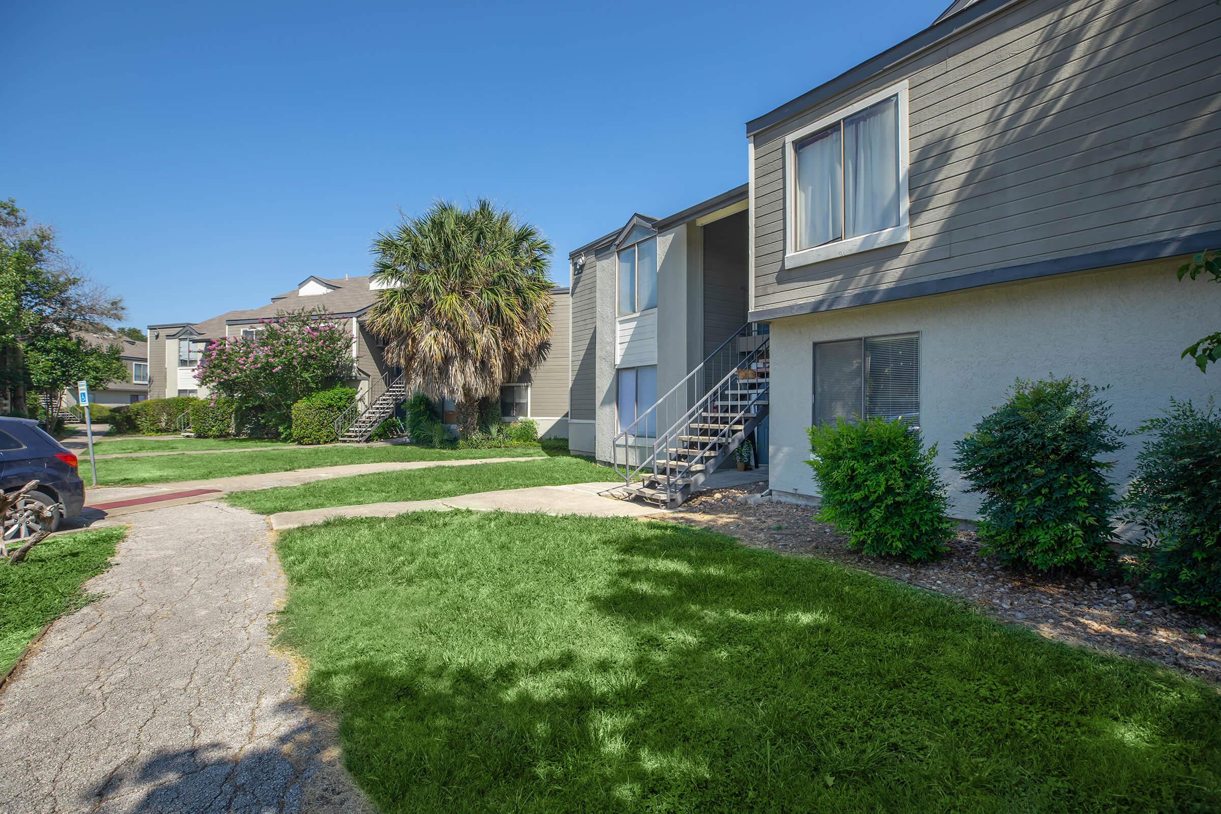 a large lawn in front of a house