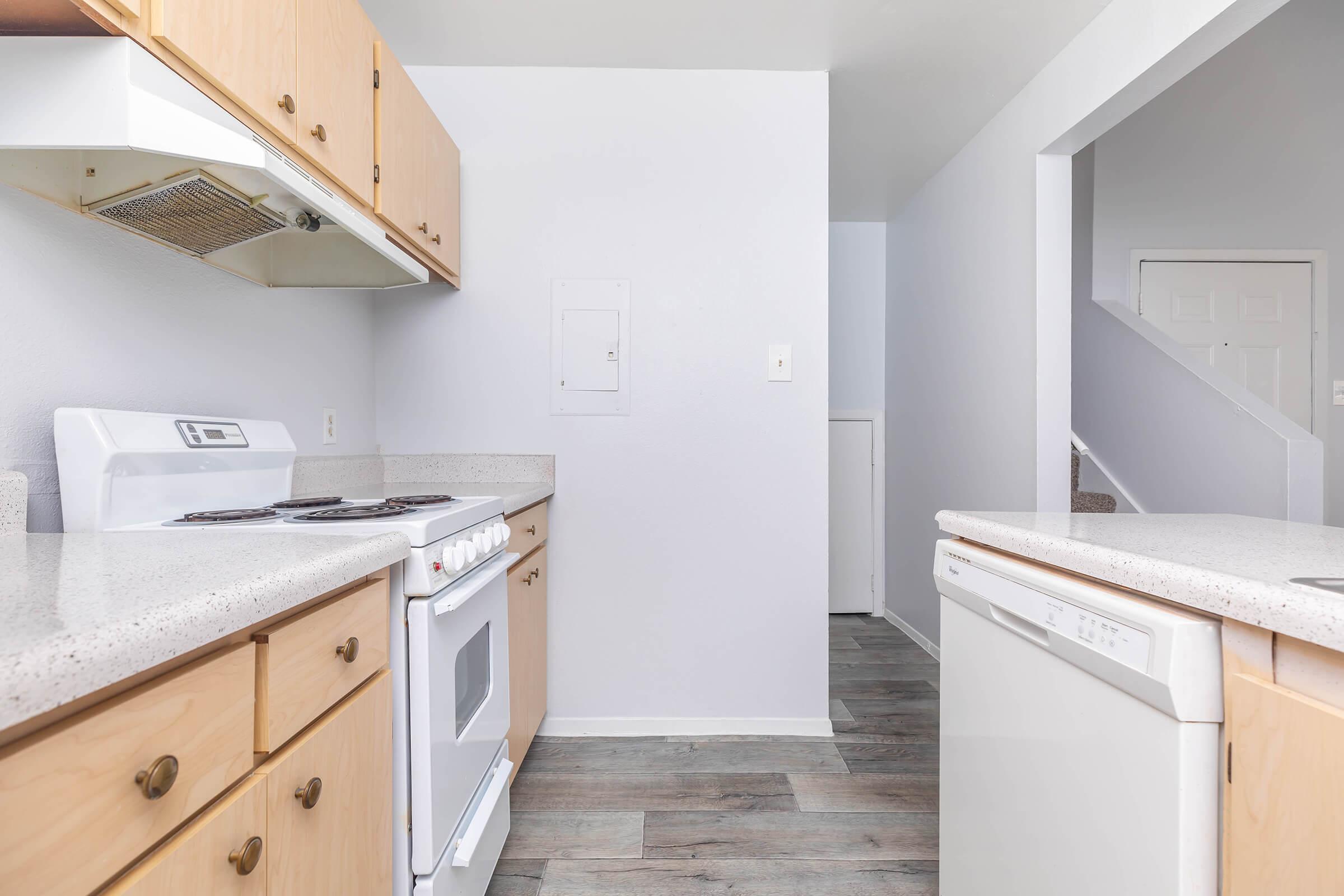 a kitchen with a stove top oven