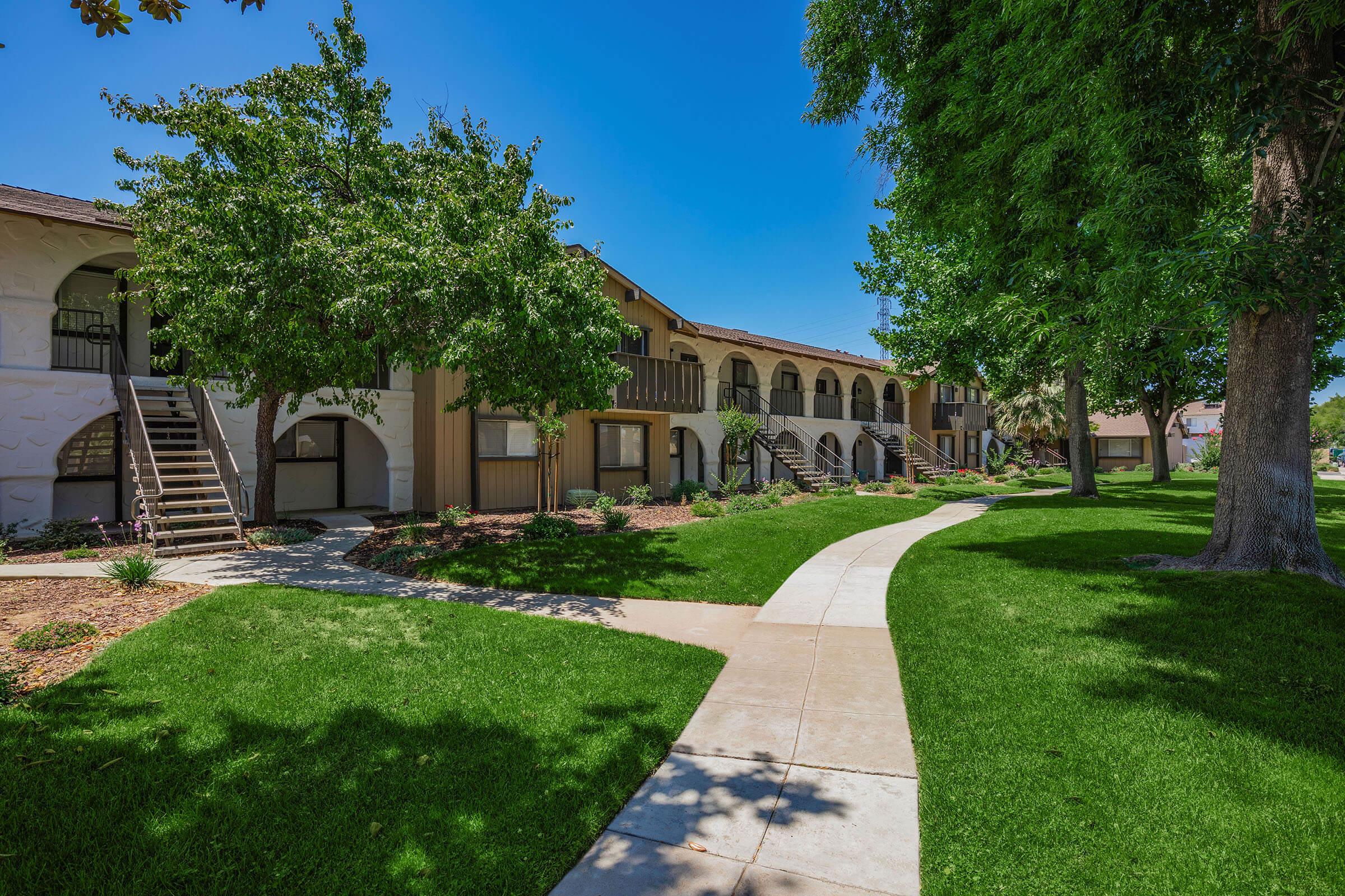 a large lawn in front of a house