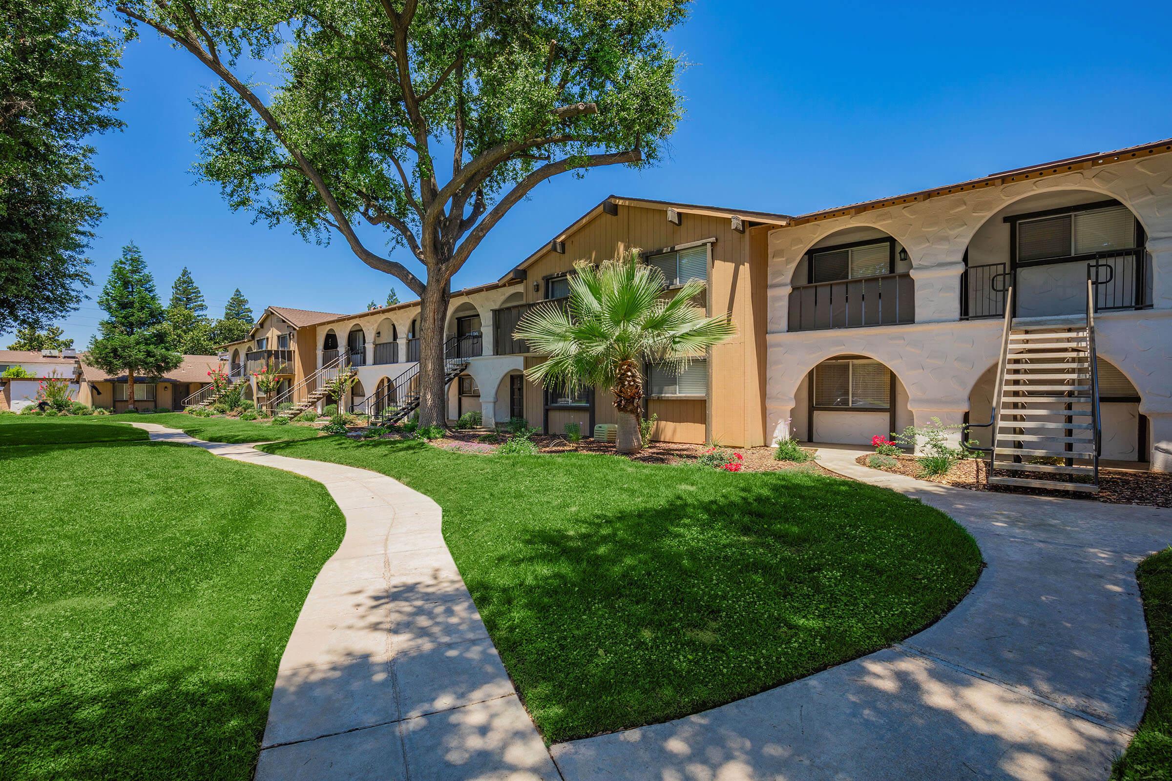 a large lawn in front of a house