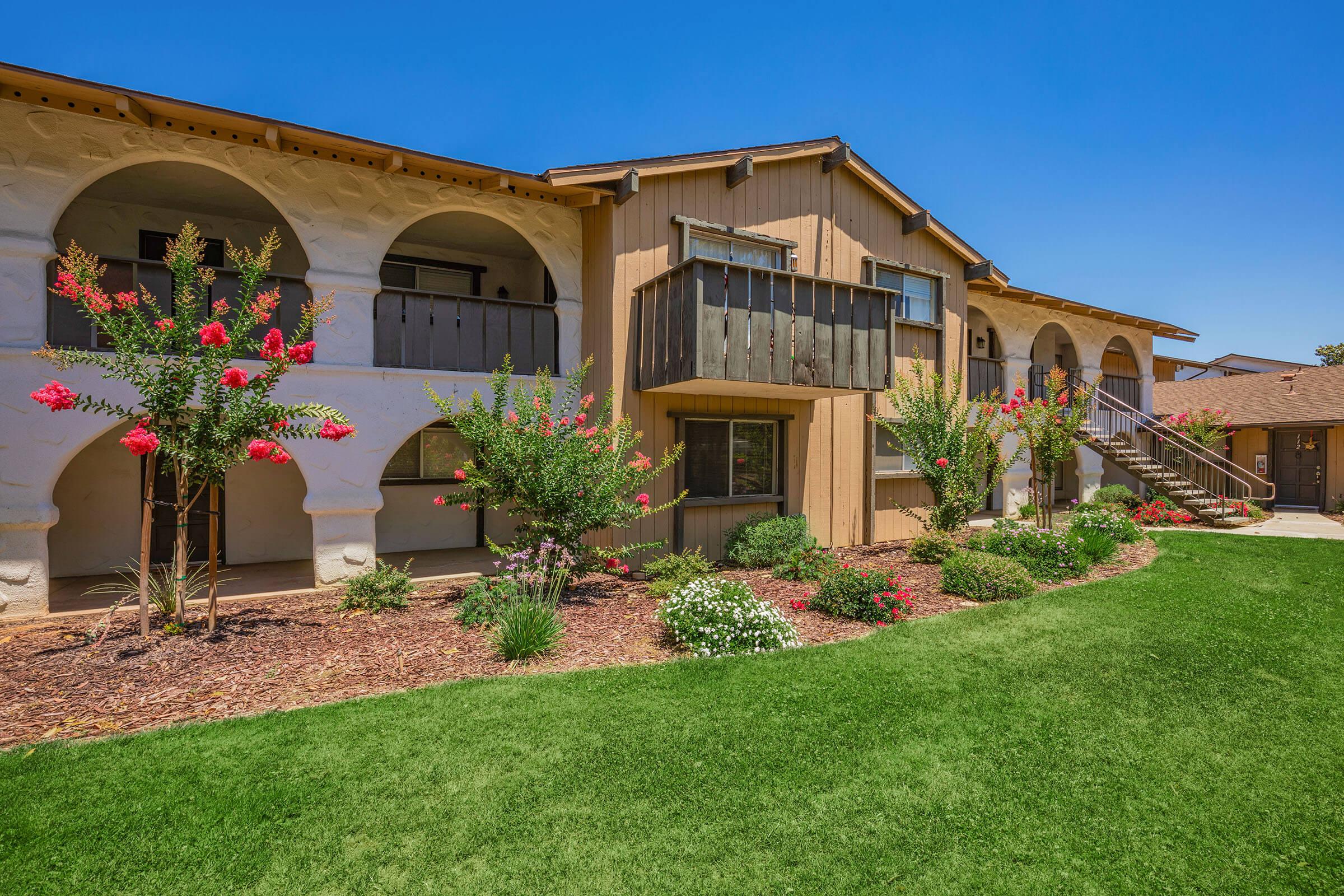 a large lawn in front of a house