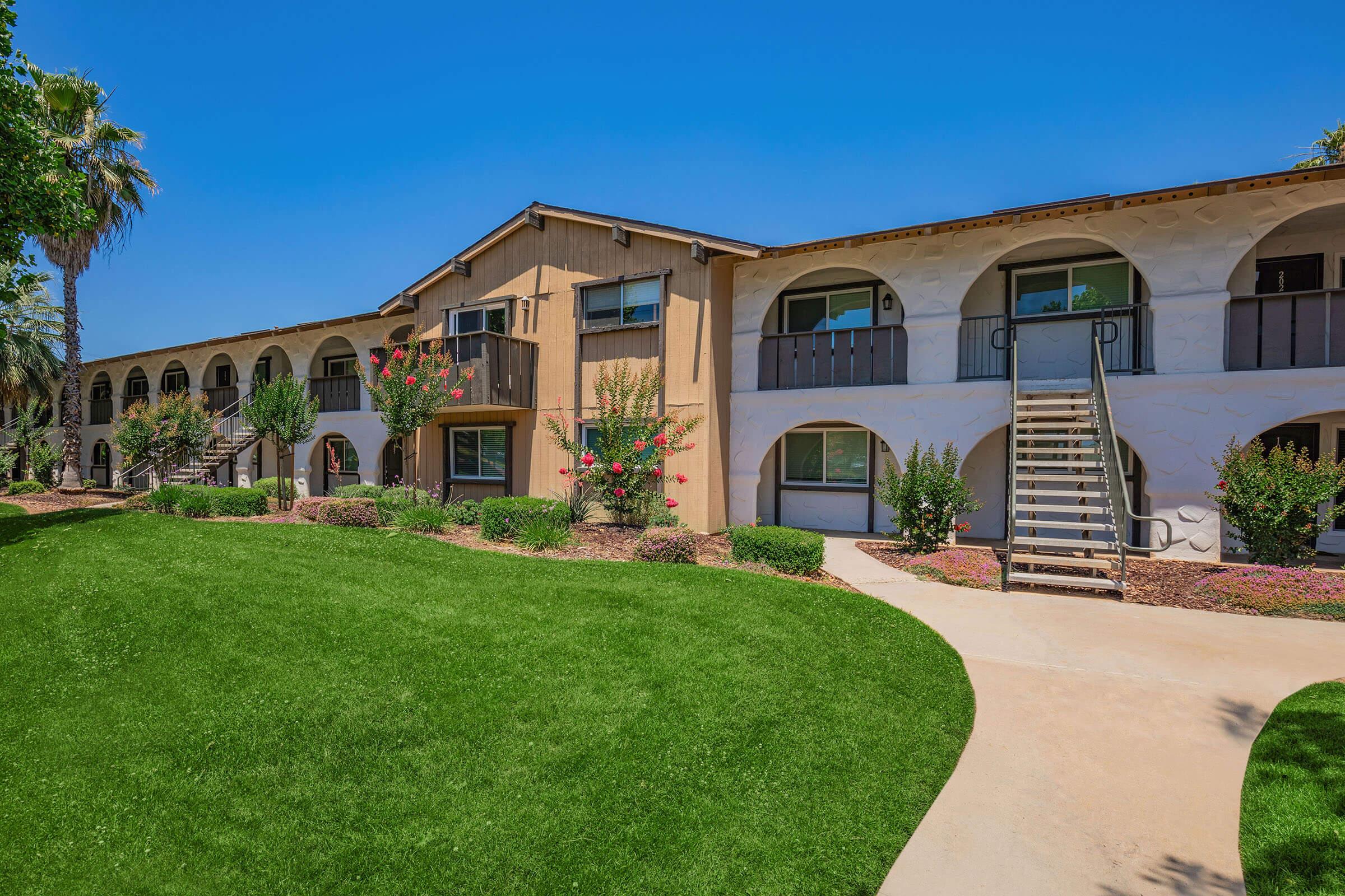 a large lawn in front of a house