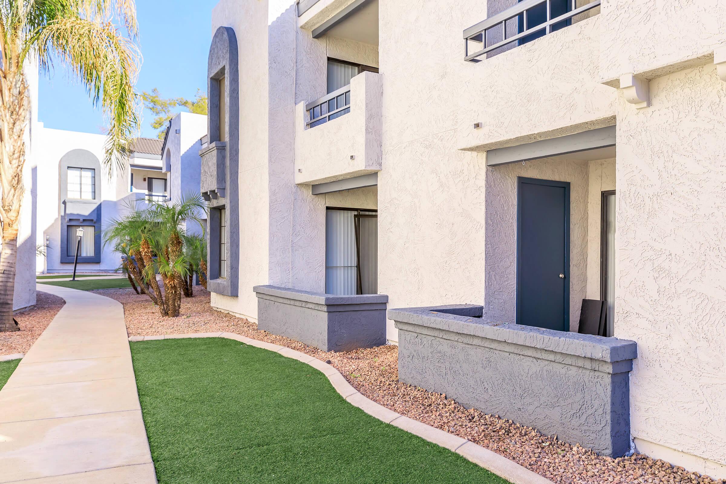 Outdoor walkway next to the Rise on Cactus Phoenix, AZ apartments