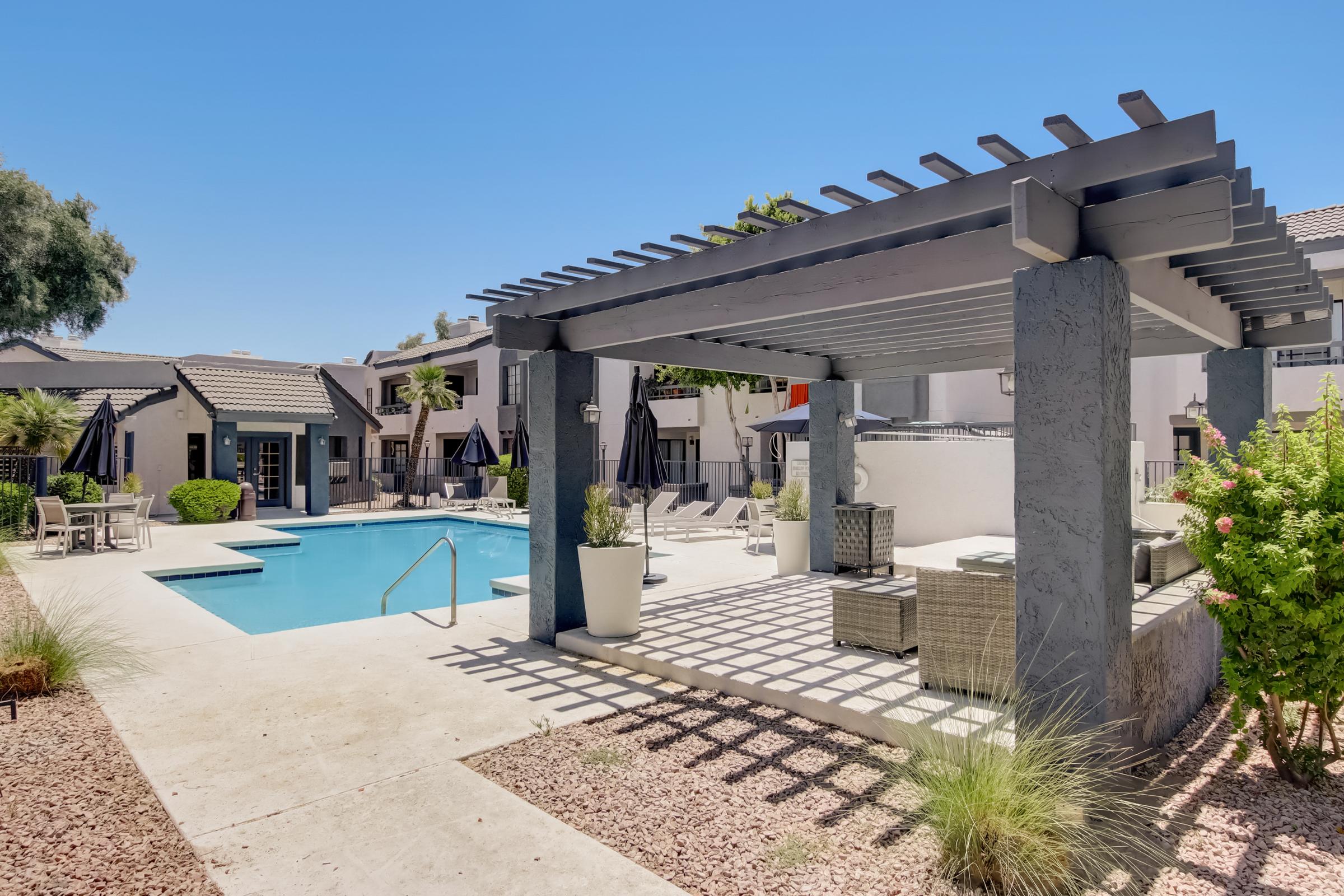 Rise on Cactus outdoor swimming pool and veranda in the middle of their Phoenix, AZ apartments