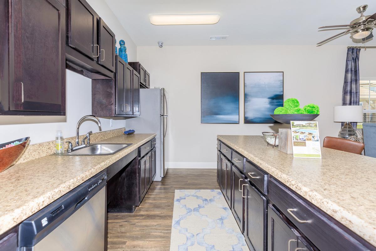 a modern kitchen with stainless steel appliances