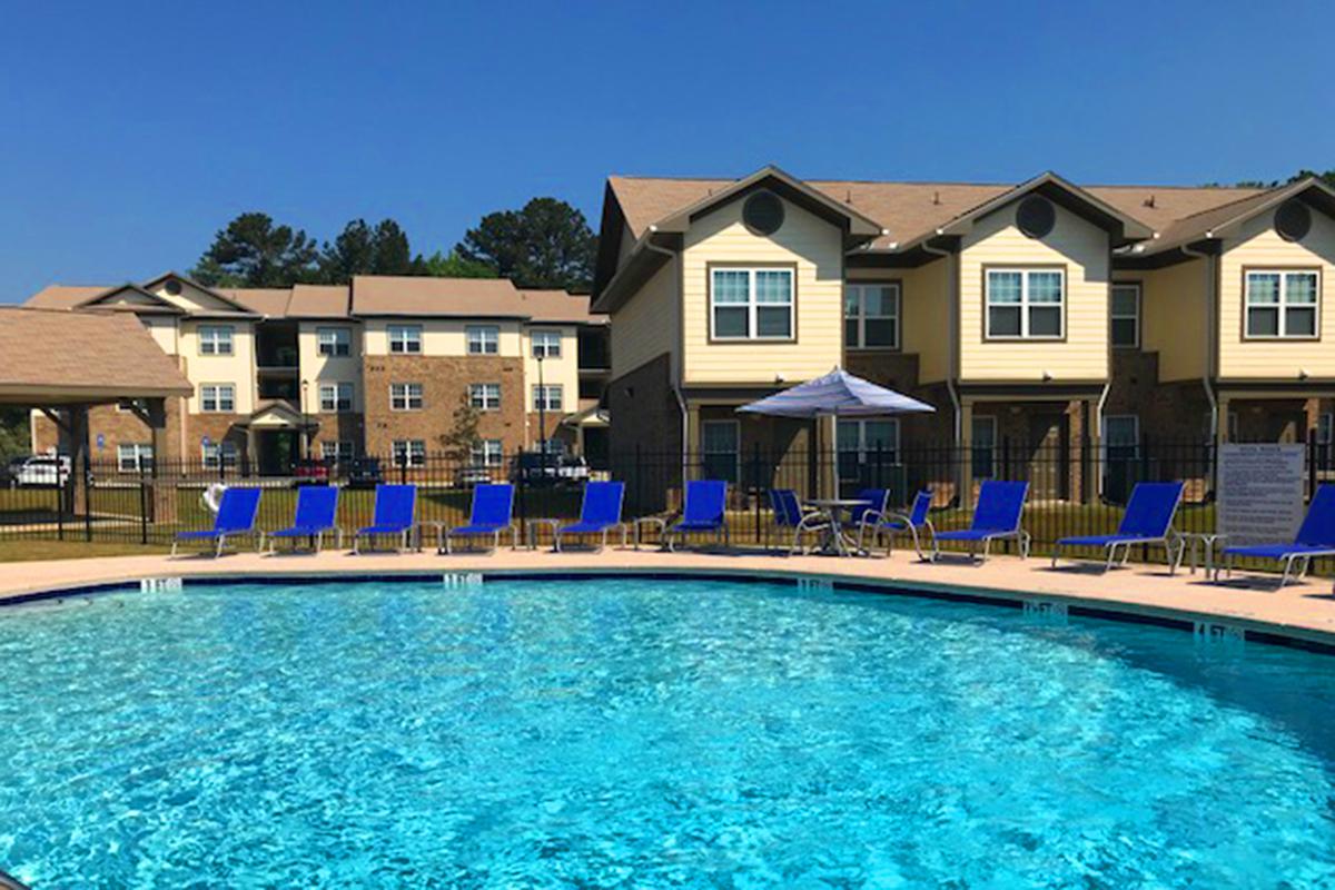 a pool next to a body of water