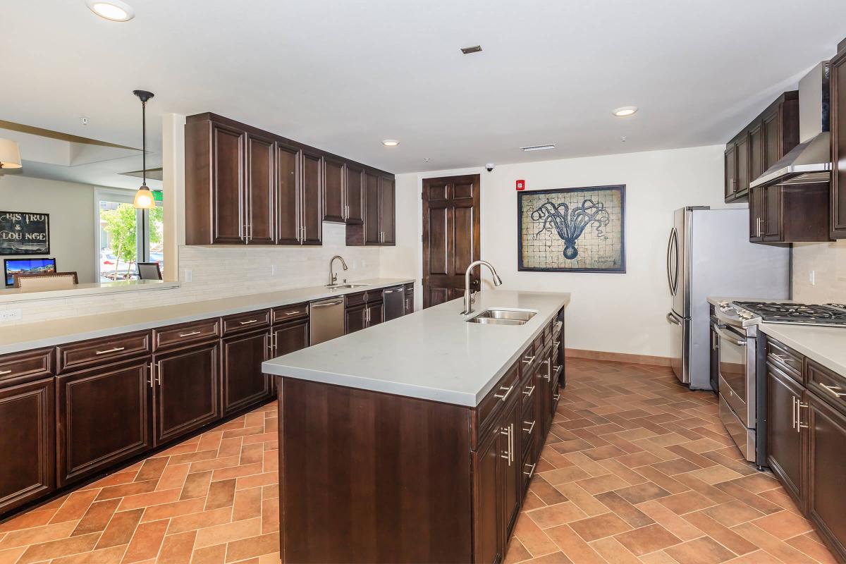 a kitchen with a tile floor