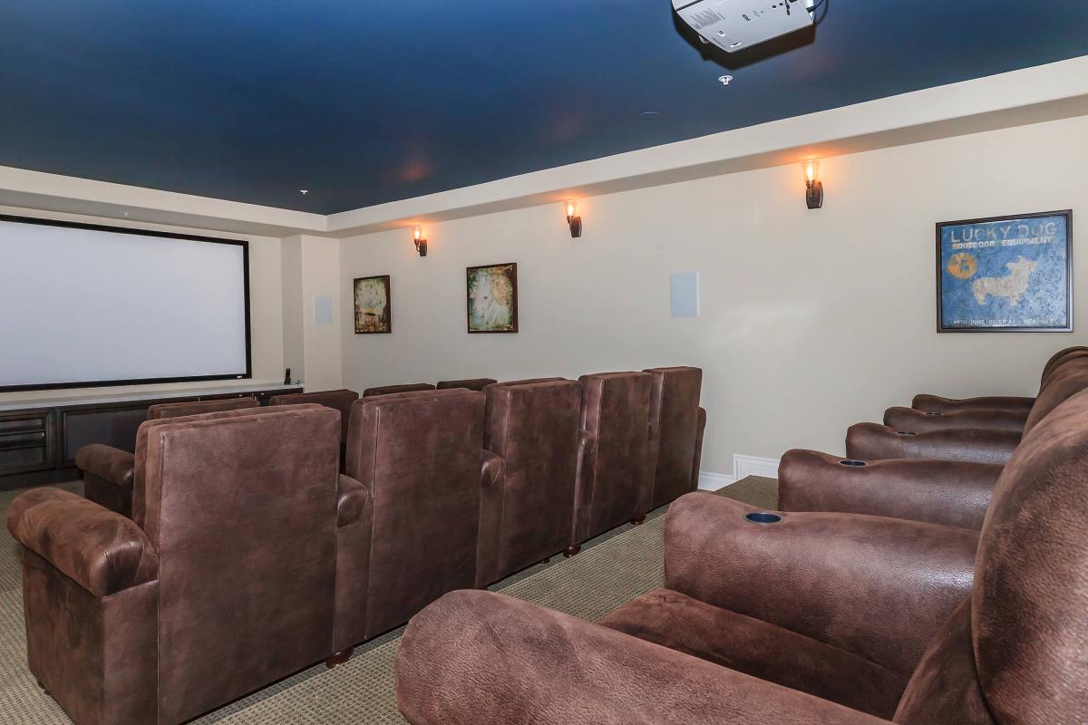 a brown leather couch in a living room