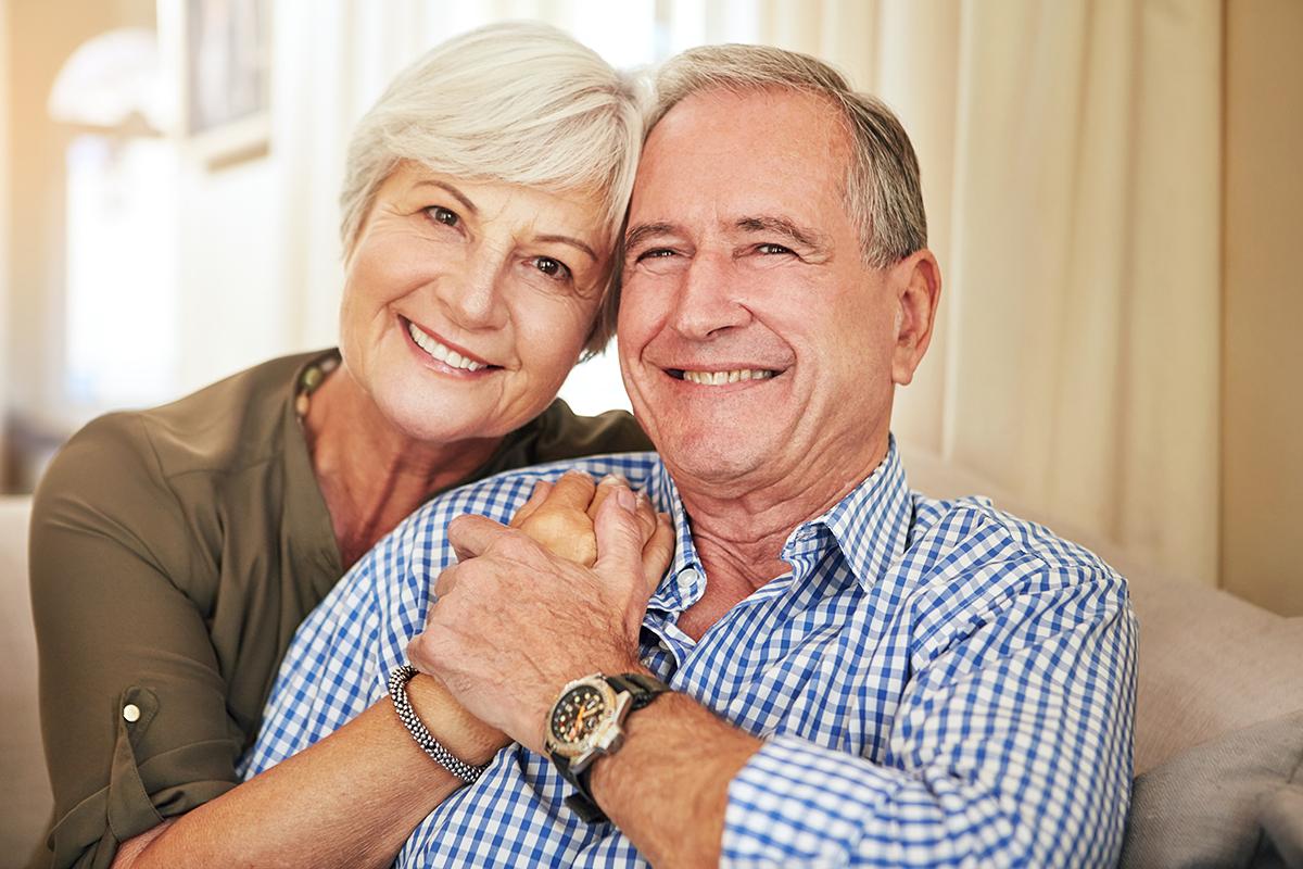 an older man is posing for the camera