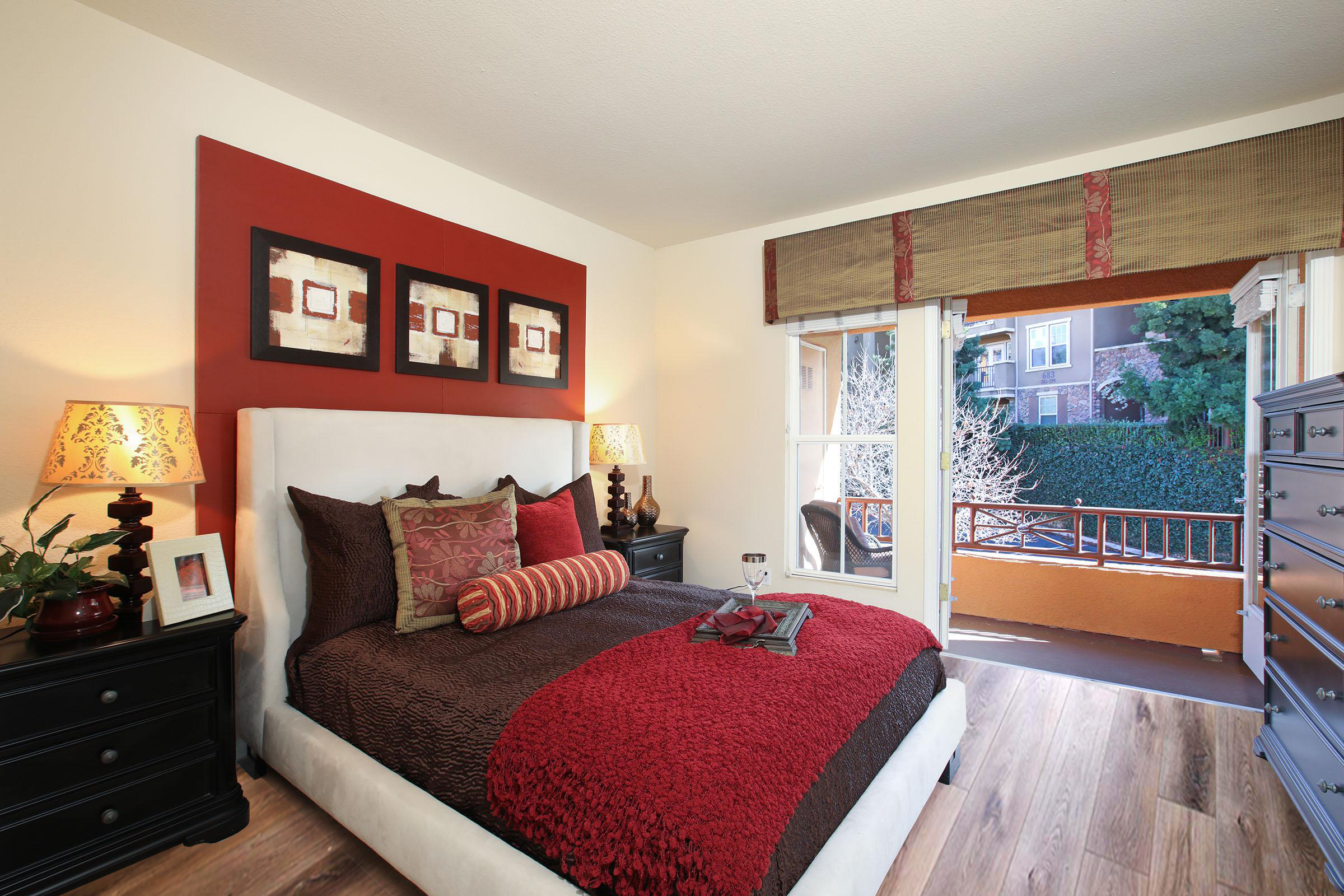 a living room filled with furniture and a flat screen tv