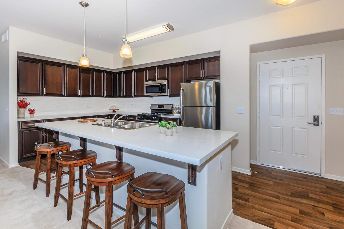 a kitchen with a dining room table