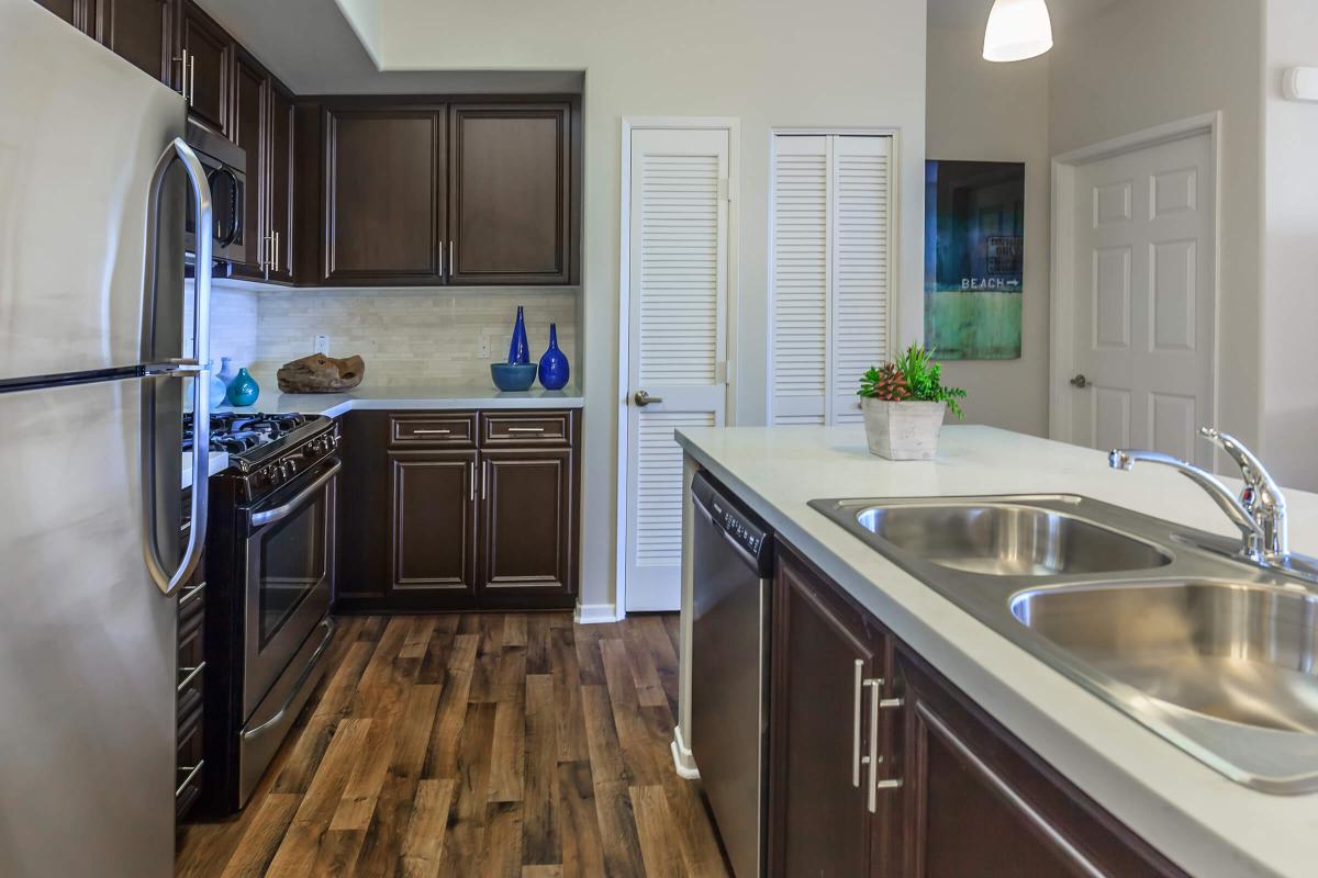 a modern kitchen with stainless steel appliances