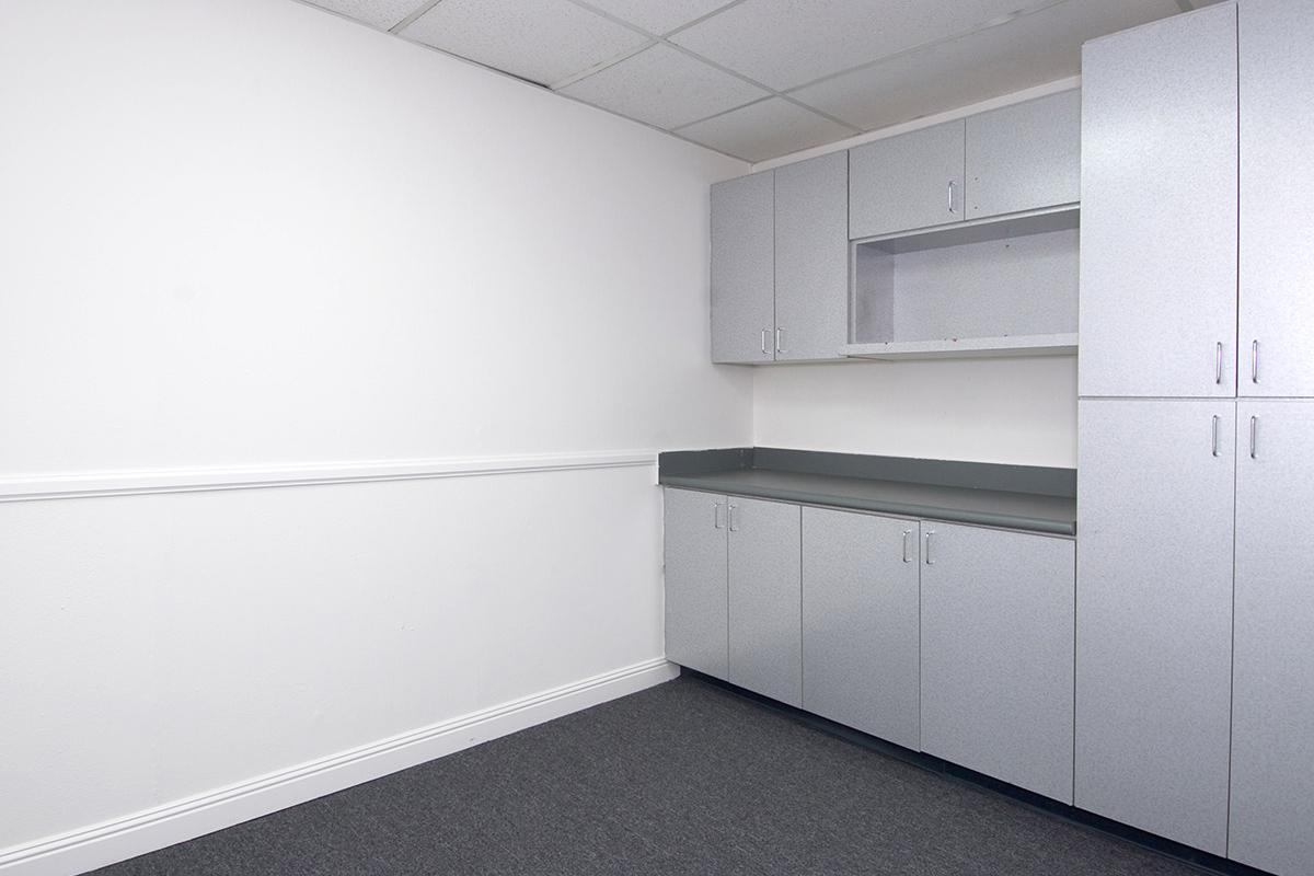 a white refrigerator freezer sitting inside of a kitchen