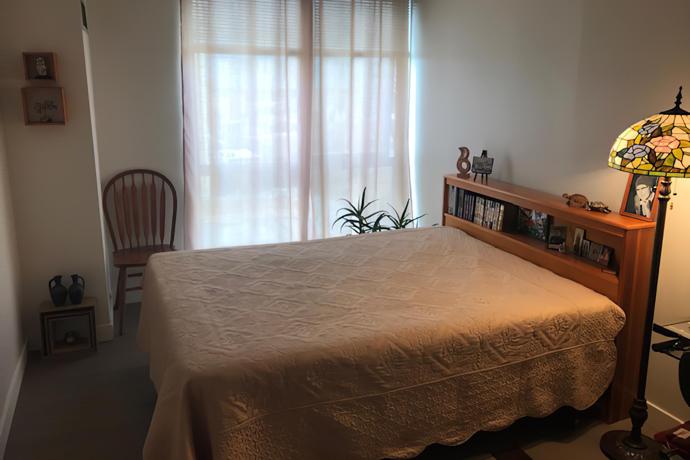 Bedroom with tan bedding