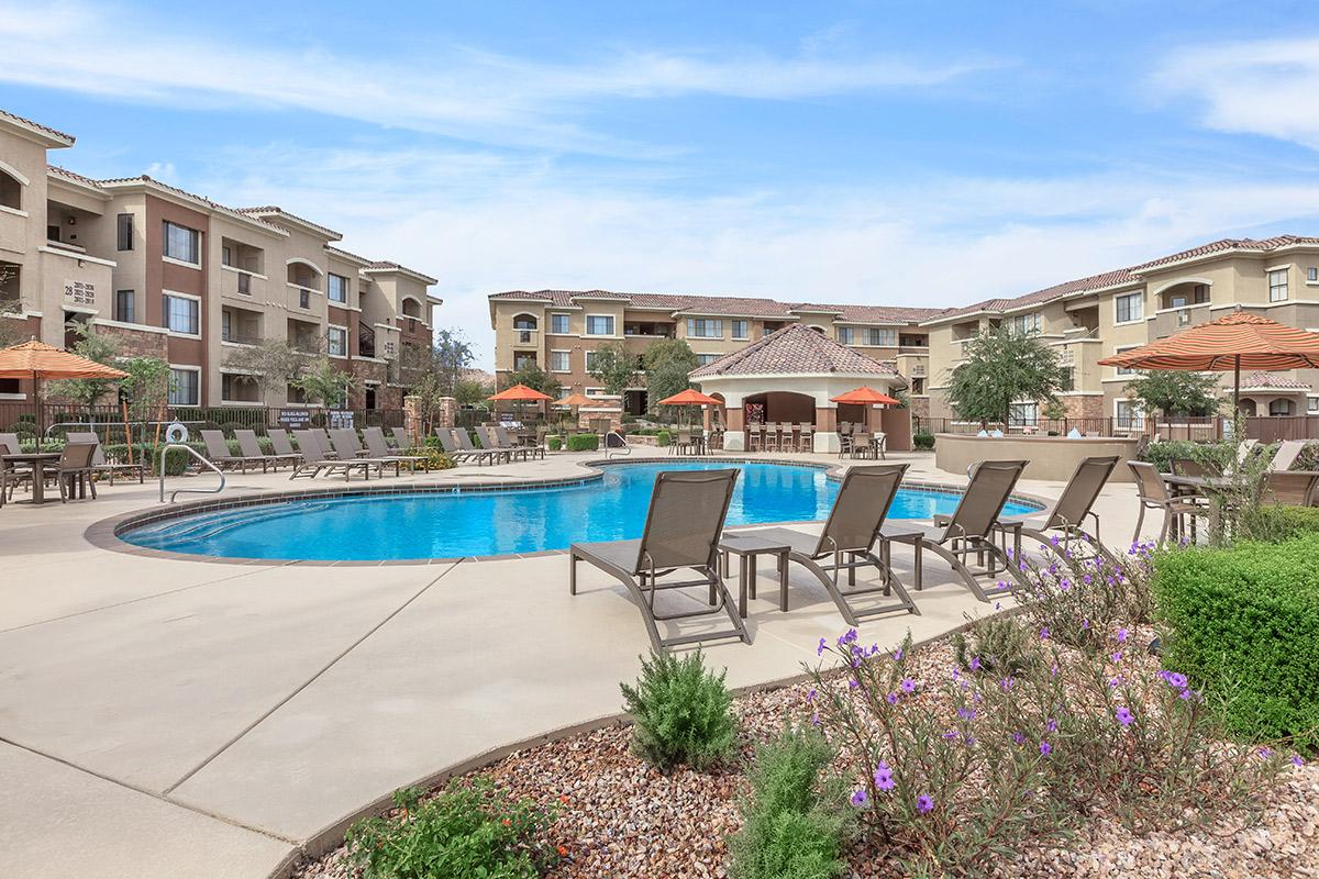 Relax poolside at The Palladium Apartments in Las Vegas, Nevada