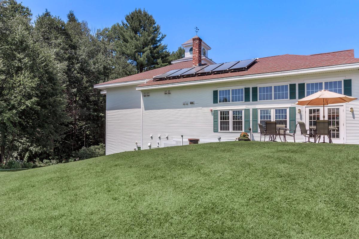 a large lawn in front of a house