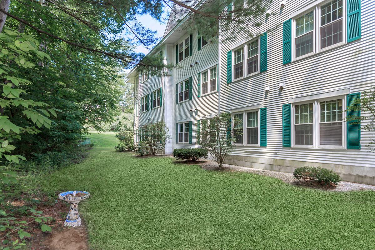 a large lawn in front of a house