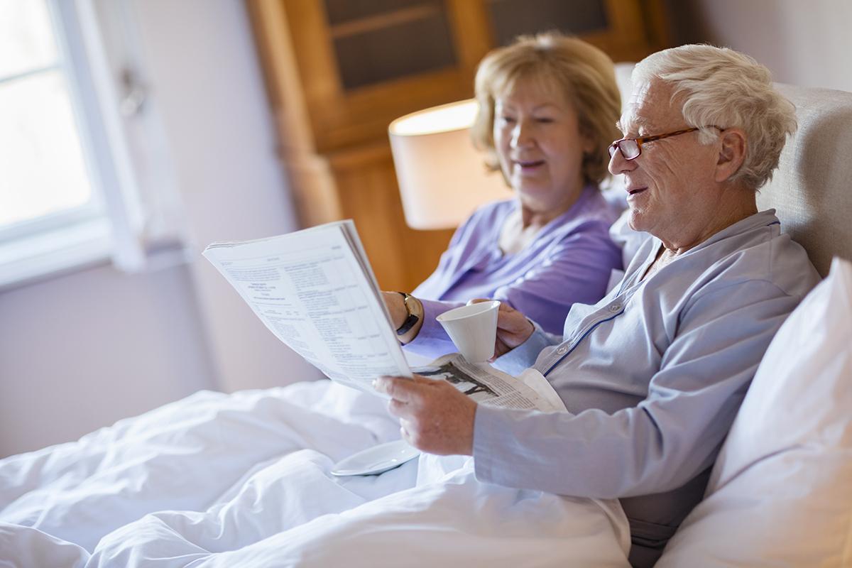 a person sitting on a bed