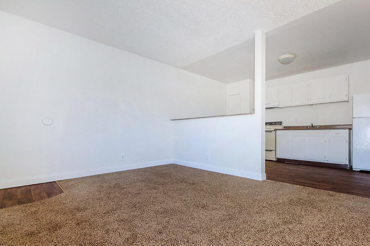 SPACIOUS LIVING ROOM AT WOODHAVEN APARTMENTS IN LAS VEGAS