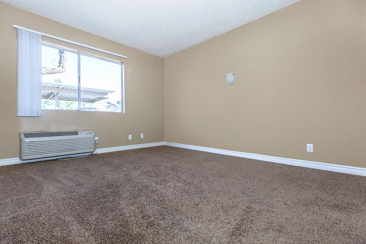 OPEN LIVING AREA AT WOODHAVEN APARTMENTS