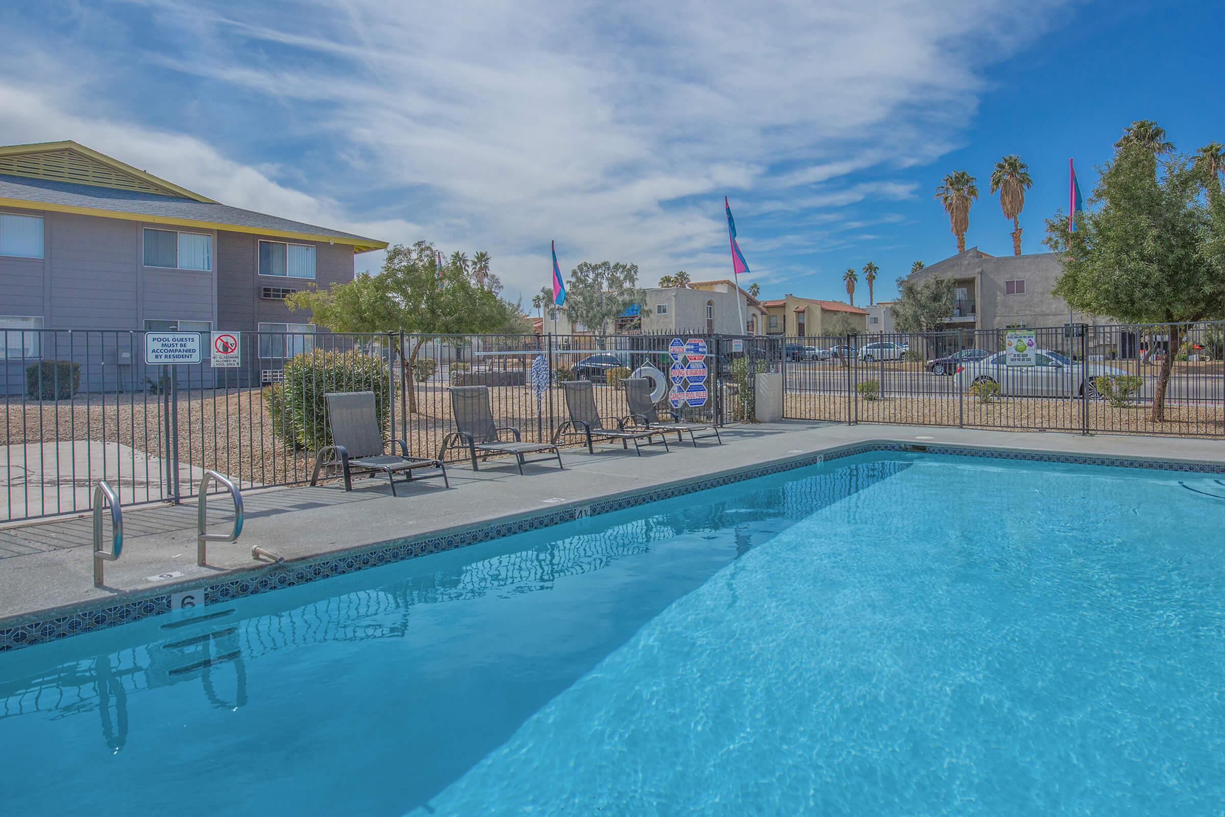 Lounge by the pool at Woodhaven Apartments in Las Vegas, Nevada