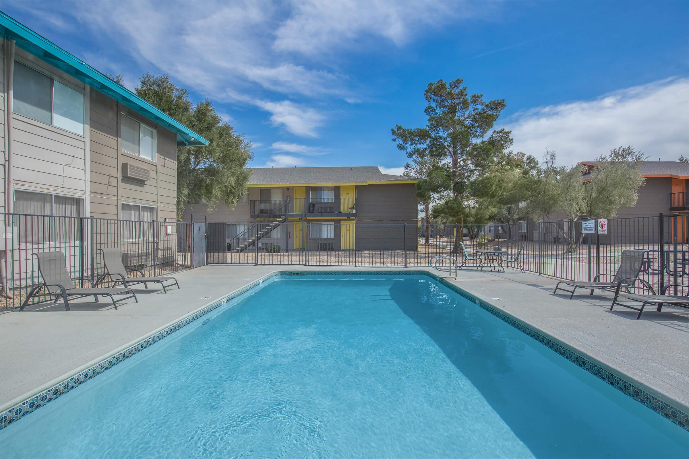 Lounge by the pool at Woodhaven Apartments in Las Vegas, Nevada