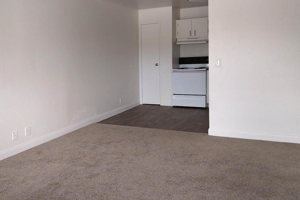 YOUR NEW LIVING ROOM AT WOODHAVEN APARTMENTS IN LAS VEGAS