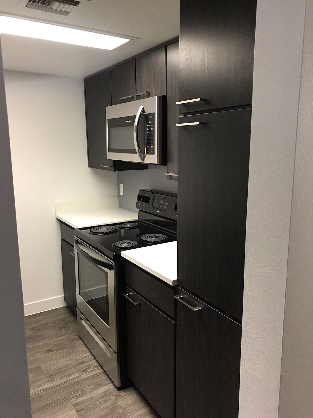 a stainless steel refrigerator in a kitchen