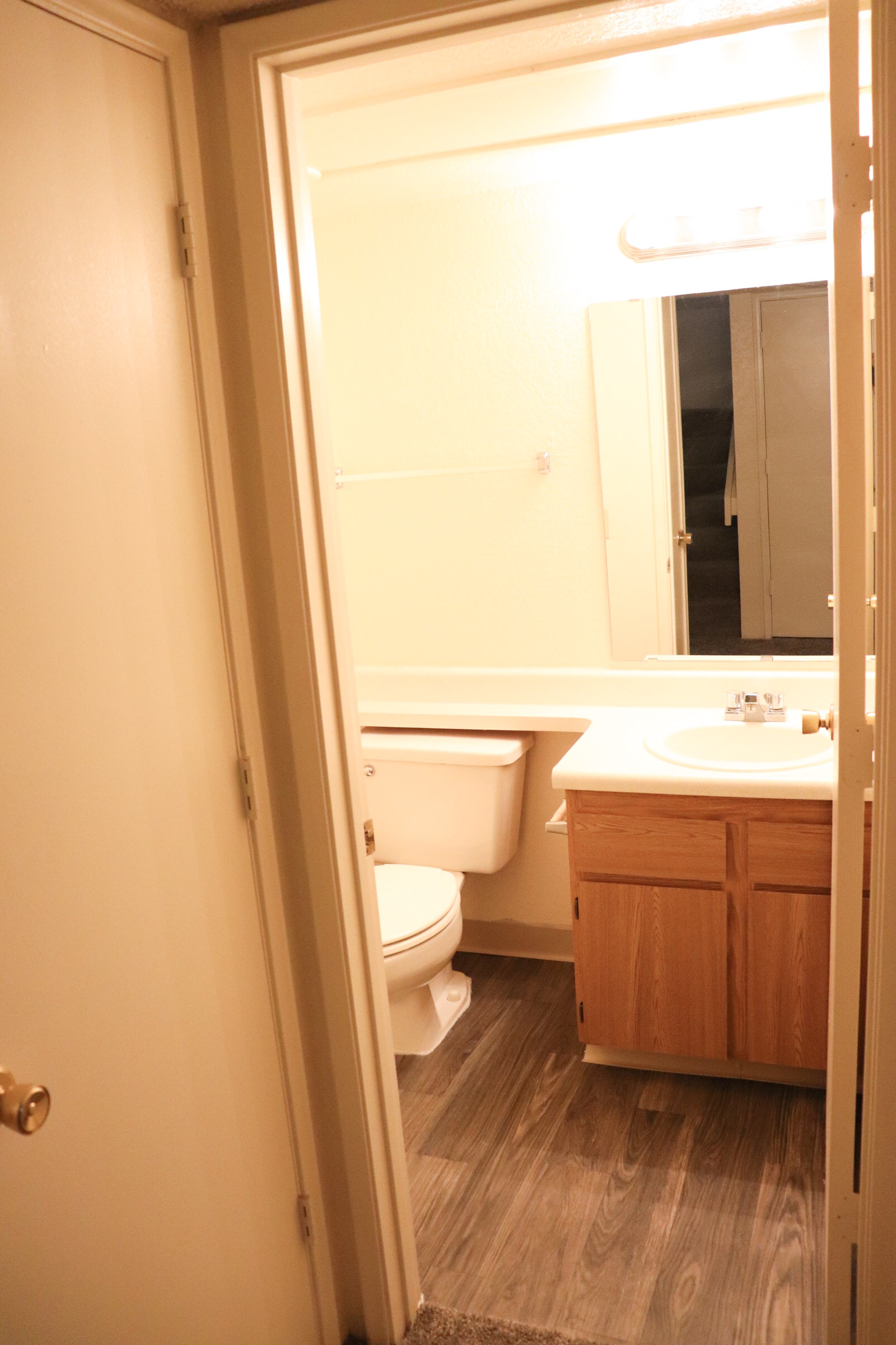 a white tub sitting next to a door
