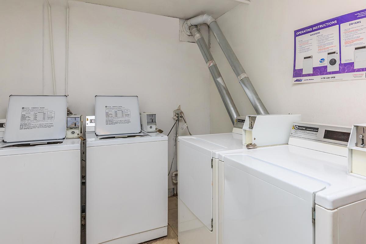 a white refrigerator freezer sitting inside of a kitchen