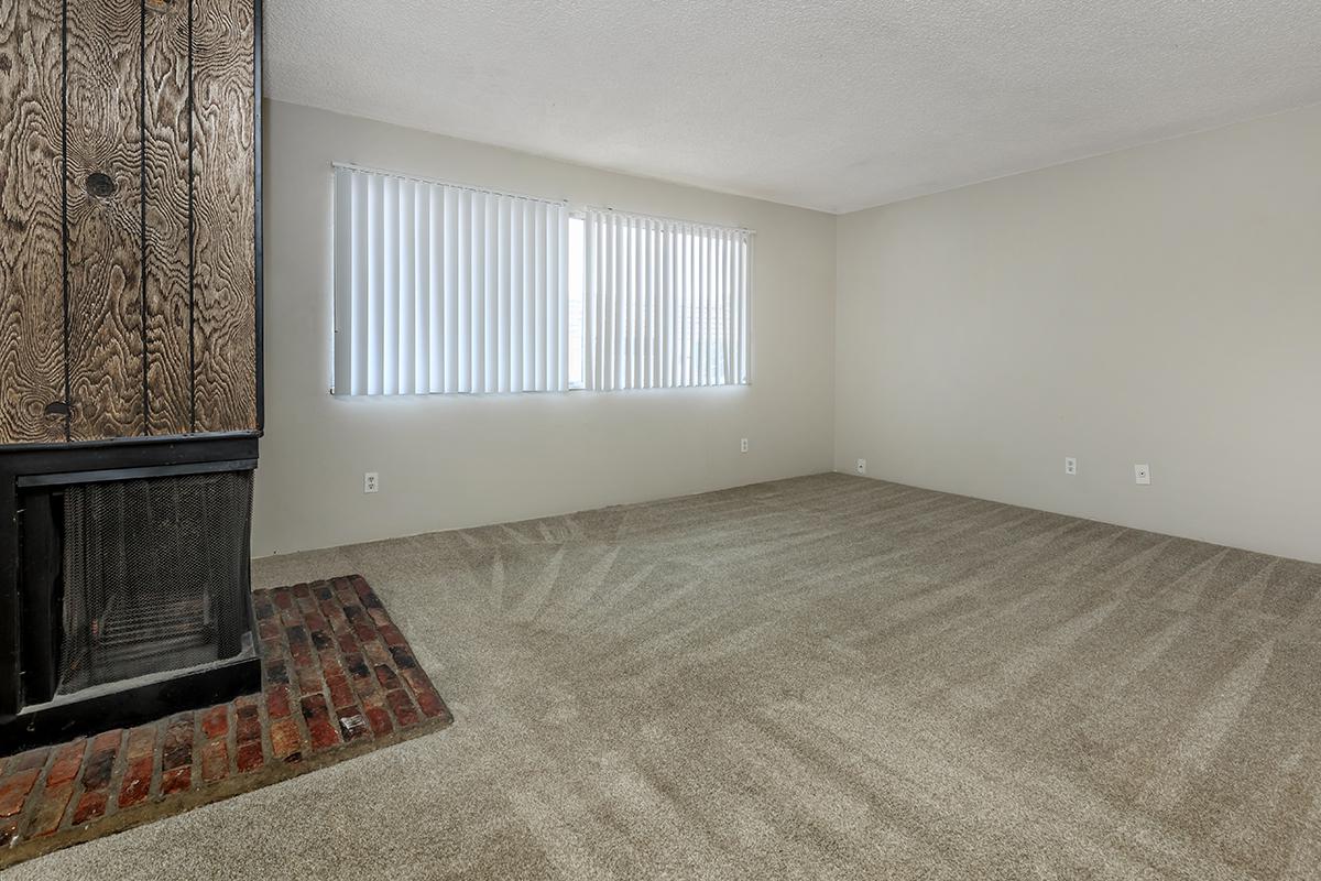 a living room with a wooden floor