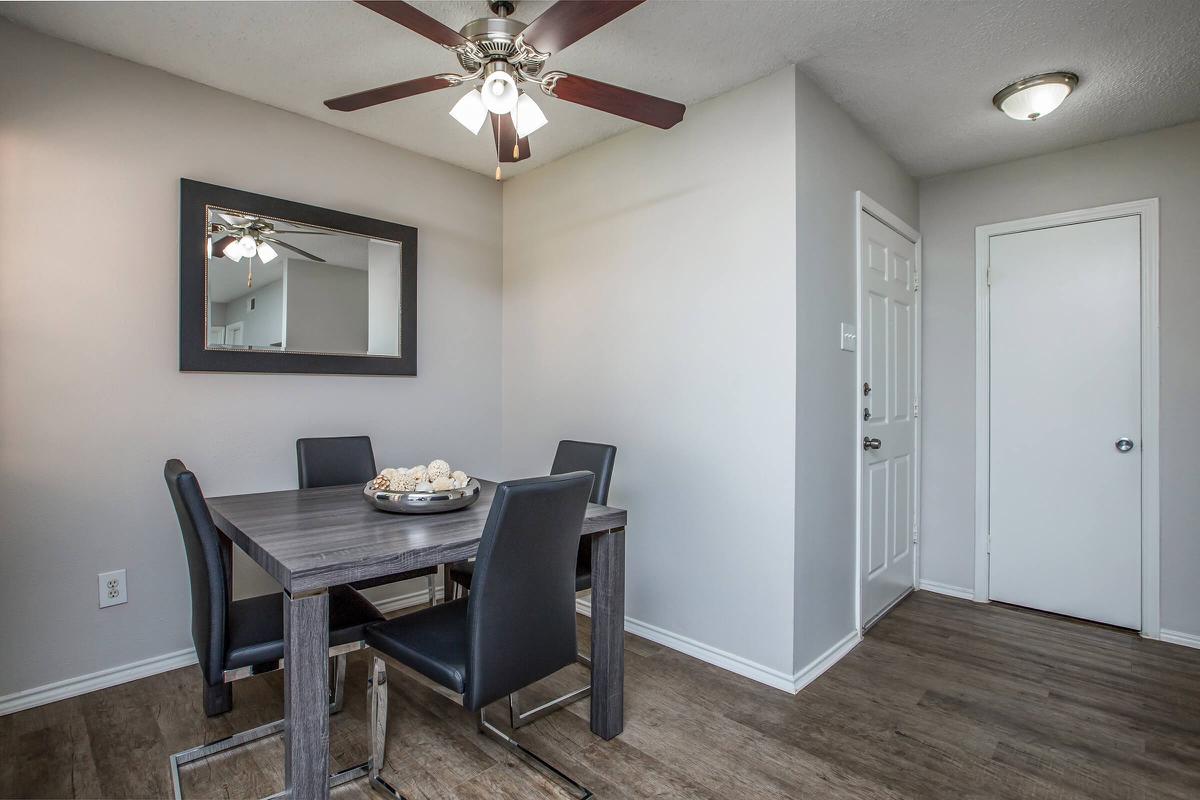 a kitchen with a table in a room