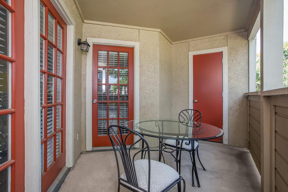 a large red chair in a room