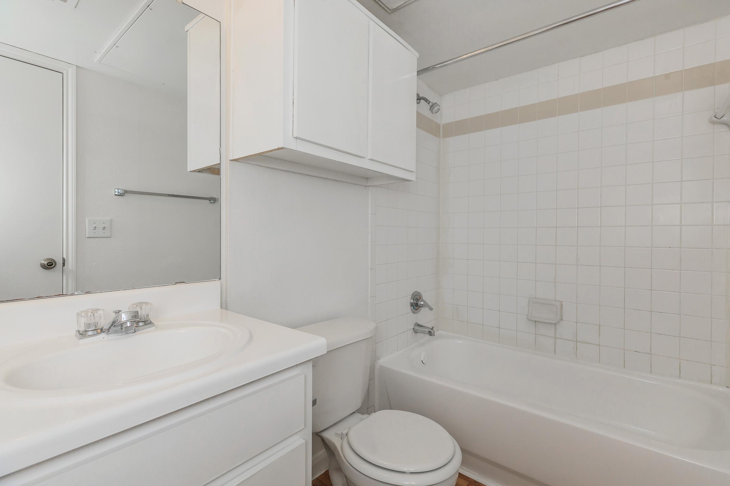 a close up of a sink and a bath tub