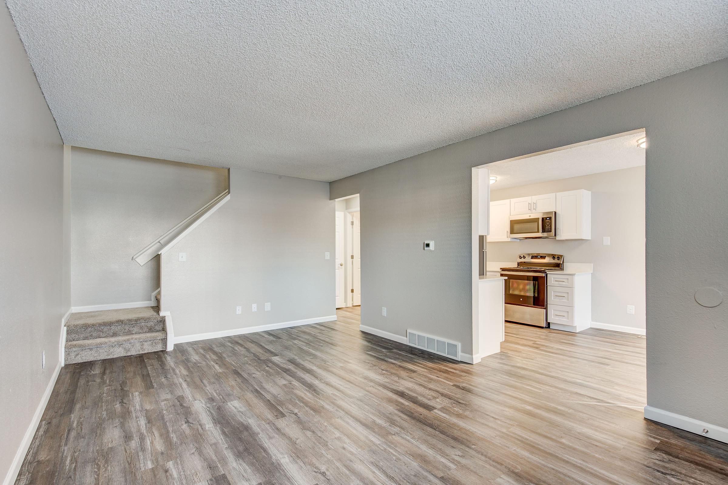 a kitchen with a wood floor